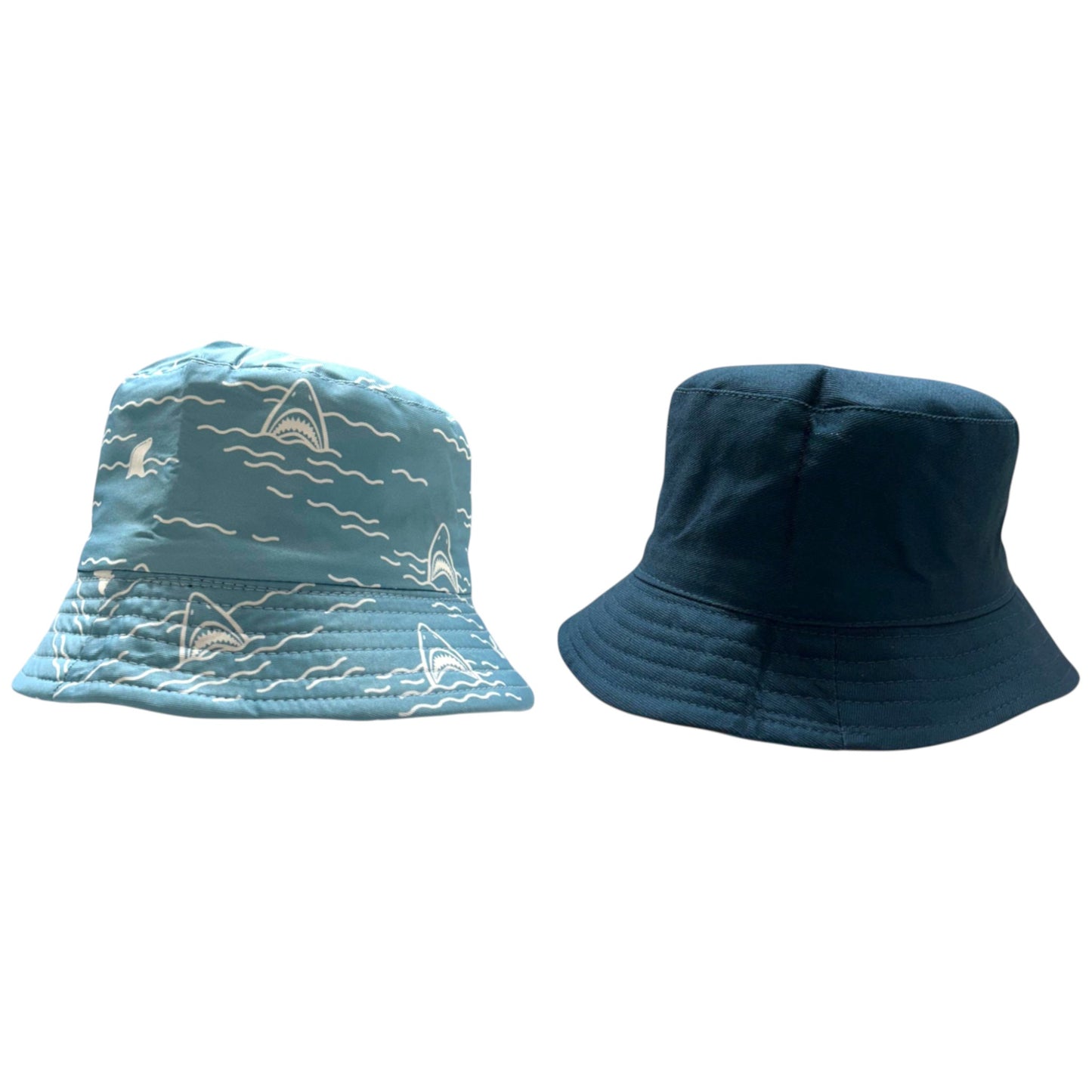 Kids reversible bucket hat with fun blue shark print on one side and solid navy blue on the other, lightweight cotton sun hat for boys and girls.