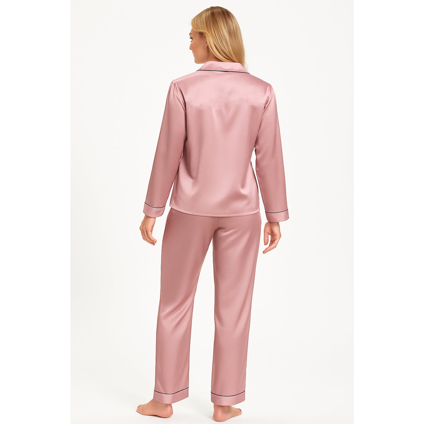 Women's soft silky touch satin pyjama set in rose pink with black piping, long sleeve button-up top and matching full-length trousers, comfortable nightwear