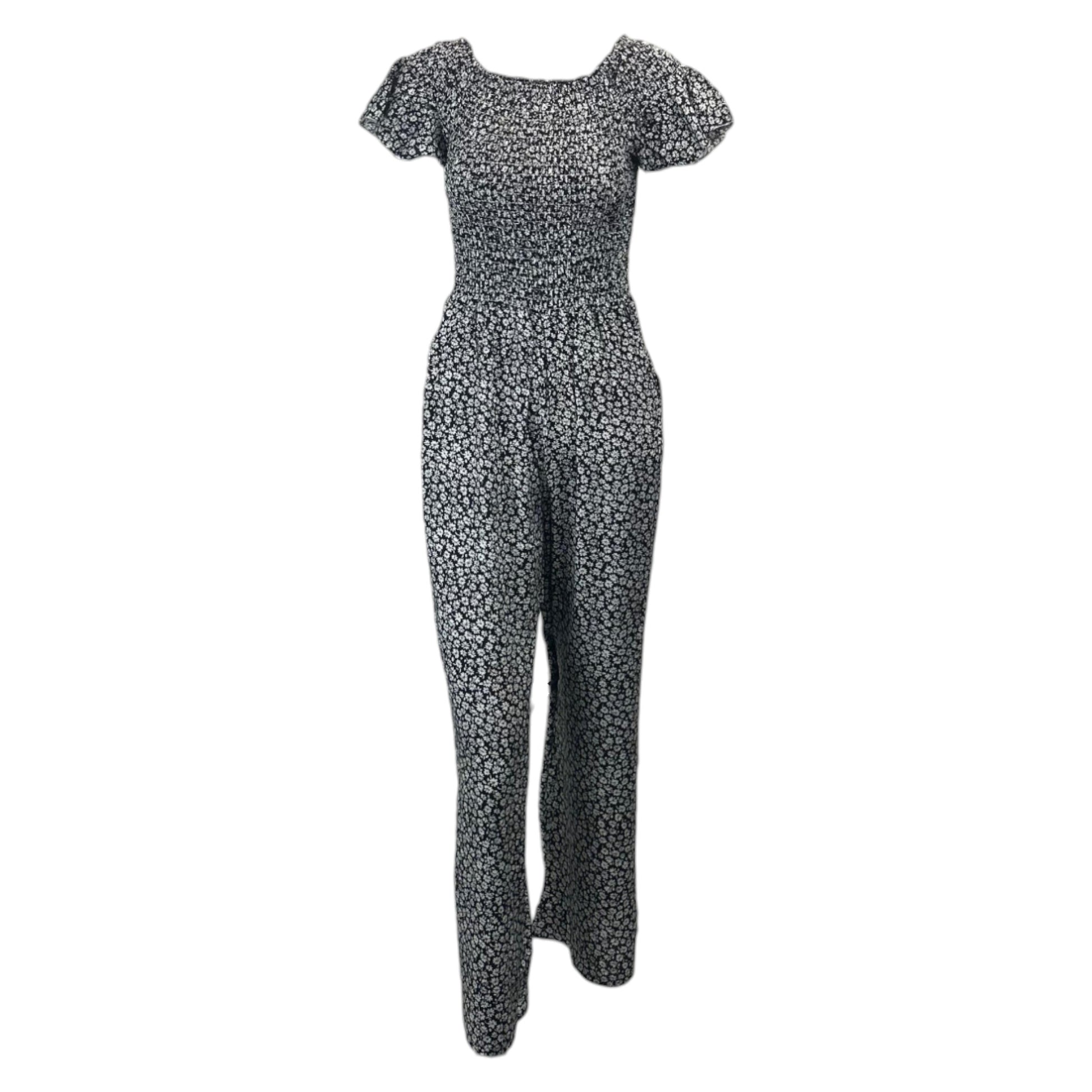 Black floral women's jumpsuit with short sleeves and cropped legs โ lightweight summer outfit