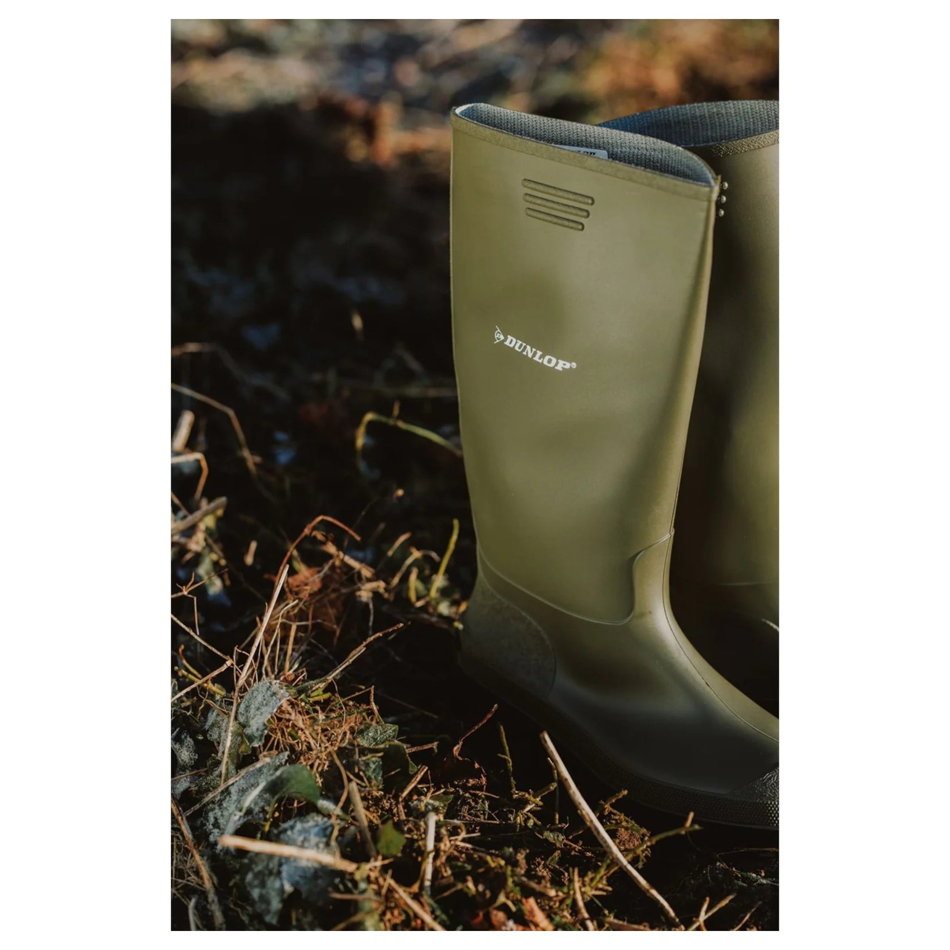 Men's Dunlop wellington boots in frosty grass – waterproof boots ideal for farming or countryside walks
