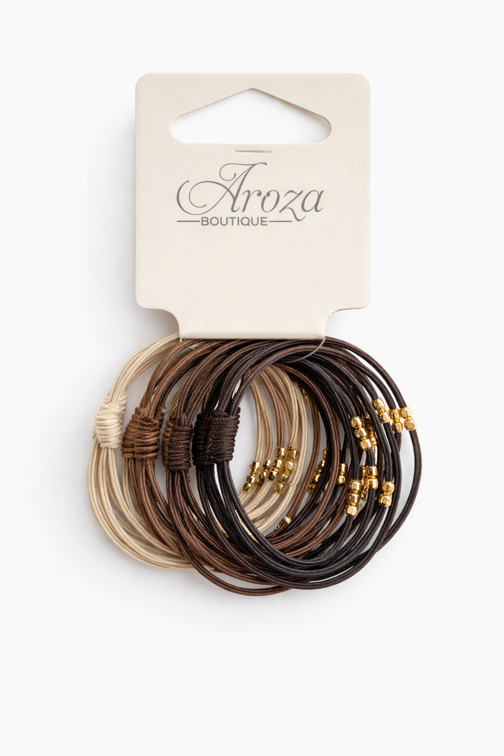 Add effortless style to your everyday look with these elegant Aroza Boutique hair ties. Designed in a beautiful mix of neutral shades including beige, tan, brown, dark brown and black, these bobbles are perfect for both casual and dressy hairstyles.