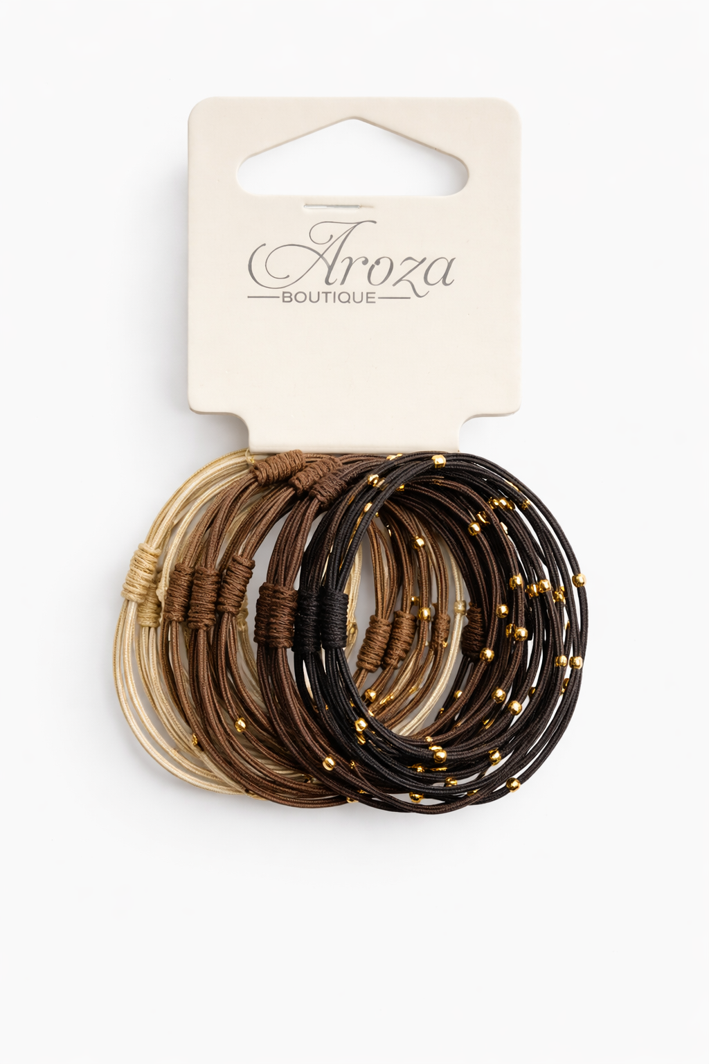 Add effortless style to your everyday look with these elegant Aroza Boutique hair ties. Designed in a beautiful mix of neutral shades including beige, tan, brown, dark brown and black, these bobbles are perfect for both casual and dressy hairstyles.