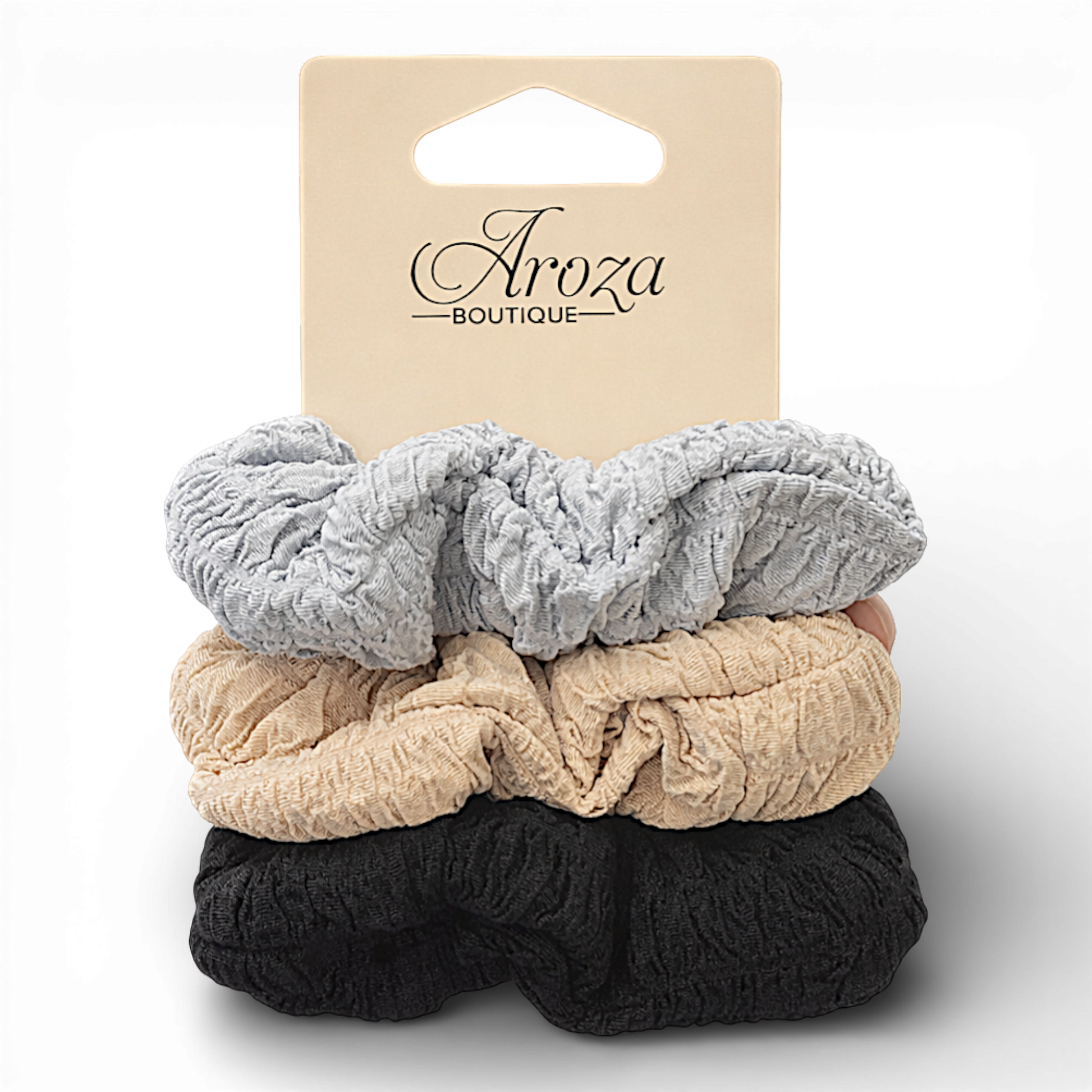 Elevate your everyday hair styling with these soft textured fabric scrunchies in timeless neutral shades. Designed to be gentle on hair while providing a secure, comfortable hold, they’re perfect for daily wear, workouts, or casual styling.