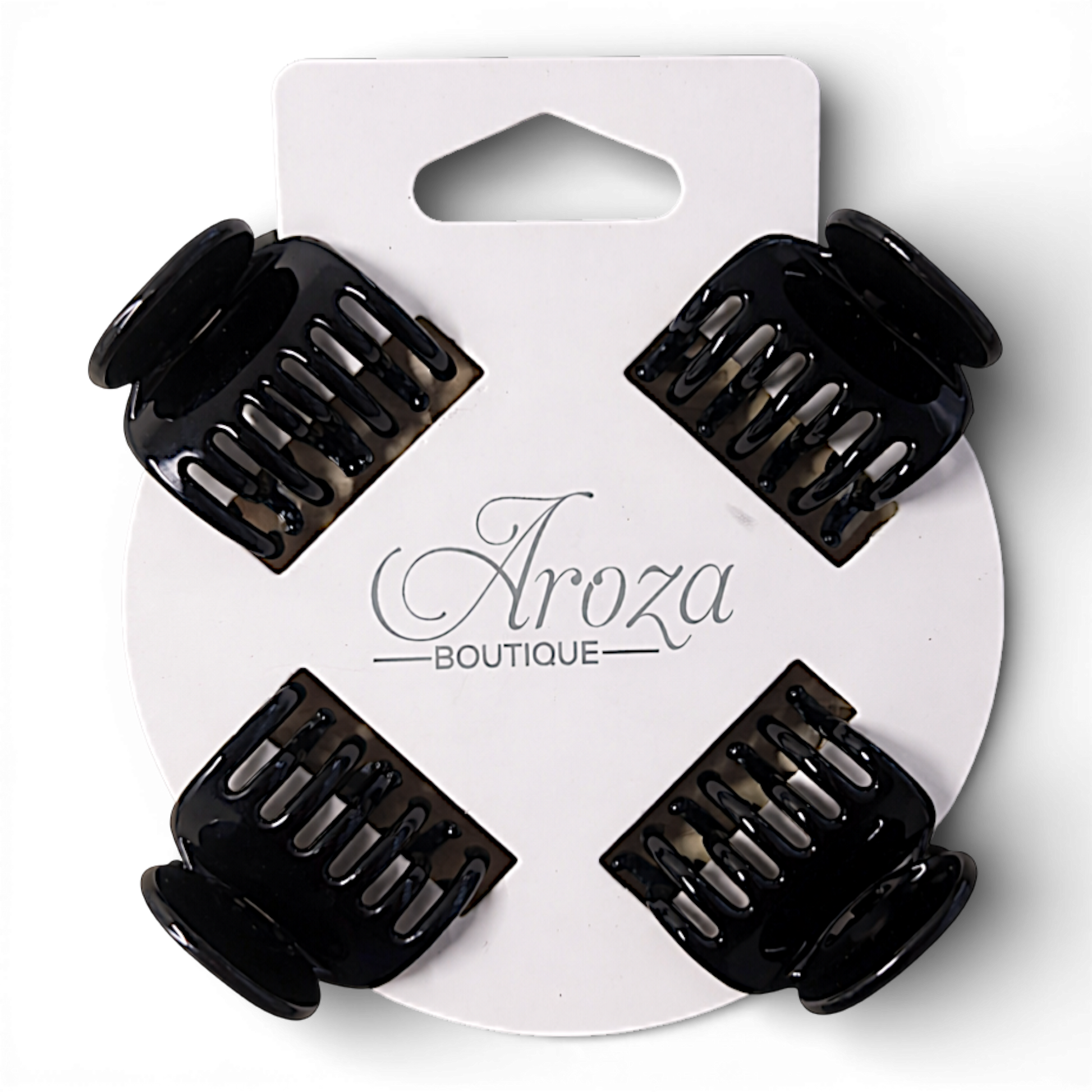 Timeless, sleek, and made to hold. These classic claw clips from Aroza Boutique offer a strong grip with a smooth, elegant finish — perfect for effortless everyday styling.