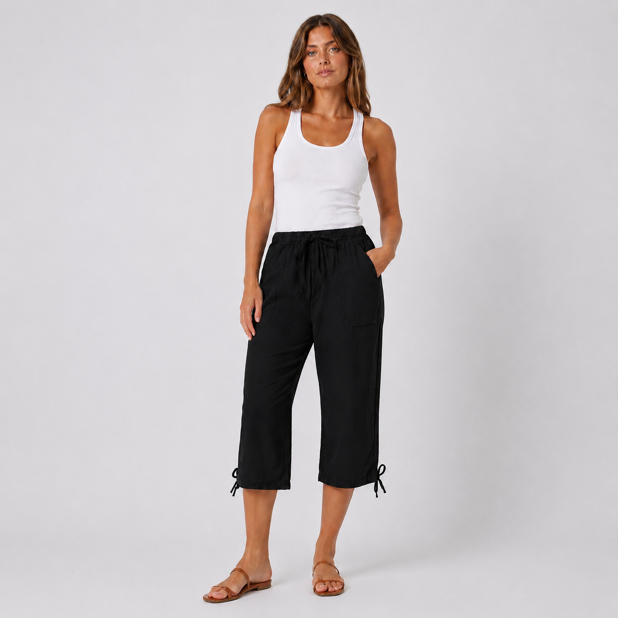 Ladies black 3/4 length pedal pusher shorts with drawstring waist and pockets