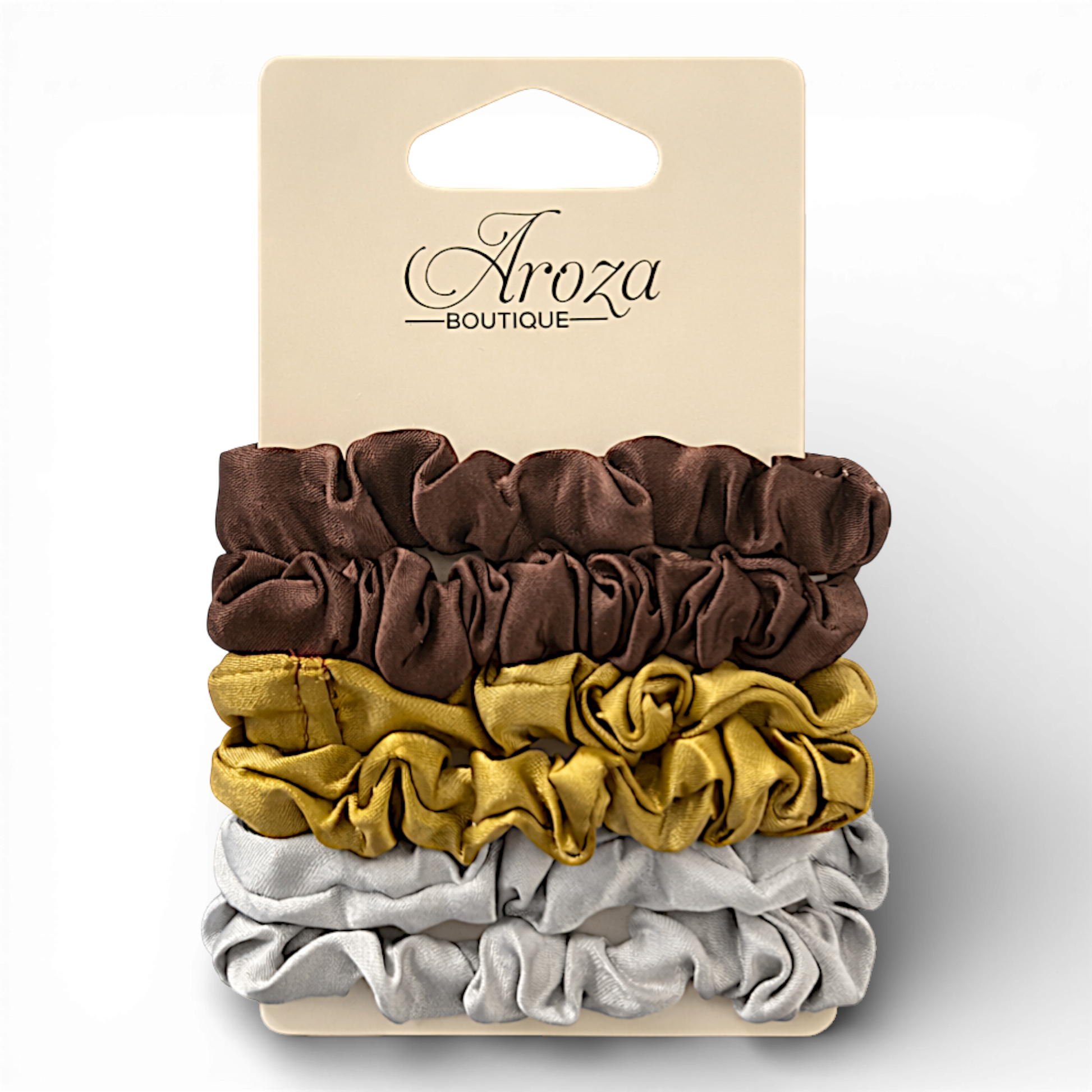 Upgrade your hair accessory game with our Neutral Luxe Satin Scrunchie Set. This stylish trio features rich brown, warm golden mustard, and soft silver tones — perfect for adding depth and sophistication to any outfit.
