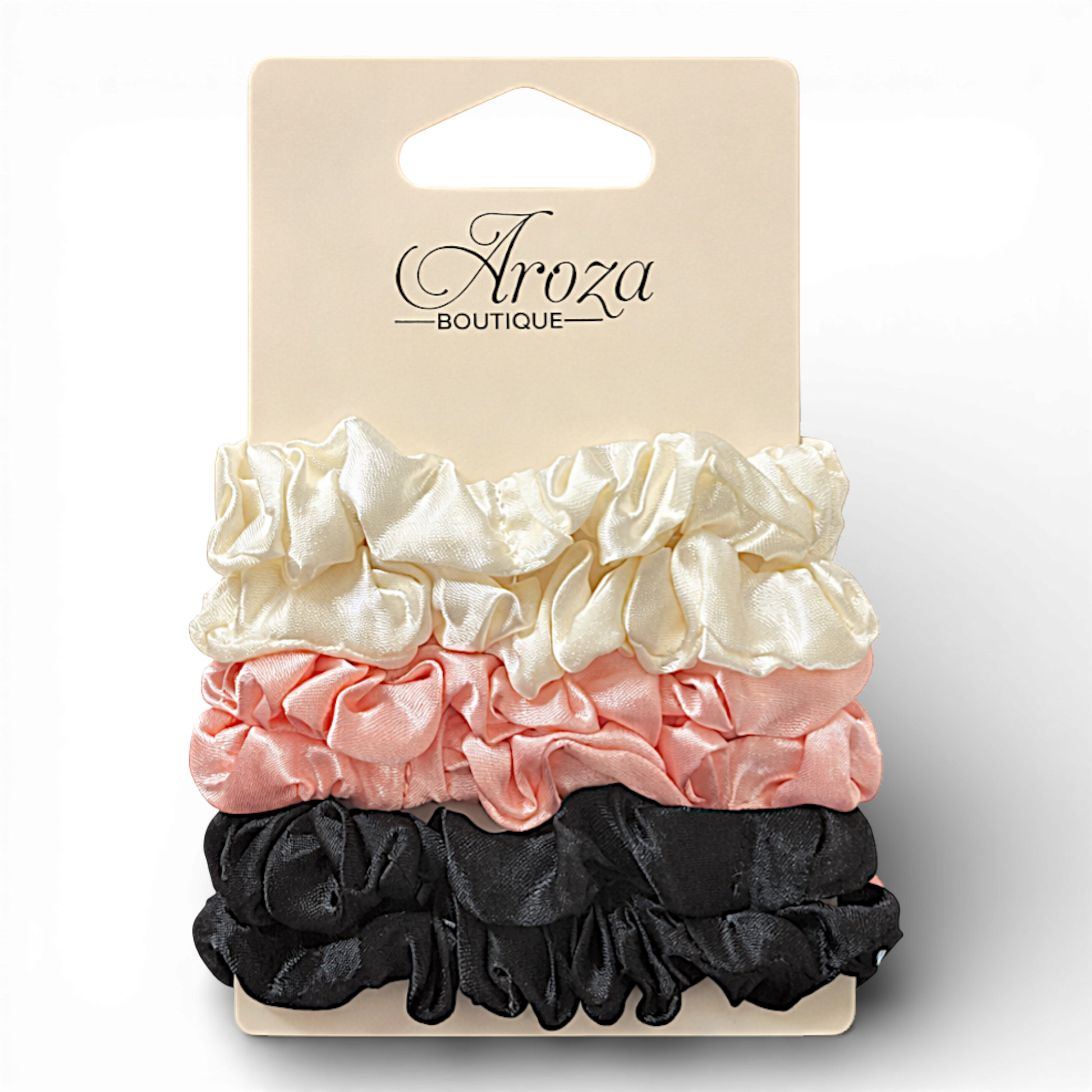 Add effortless elegance to your everyday hairstyles with our Blush Satin Scrunchie Set. Featuring a timeless trio of ivory, soft blush pink, and classic black, these silky scrunchies are designed to be gentle on your hair while elevating any look — from casual ponytails to polished buns.