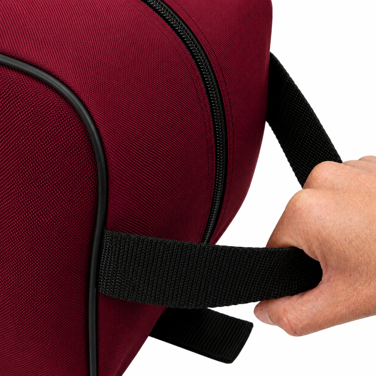 Burgundy waterproof boot bag with a curved zip opening and durable fabric finish