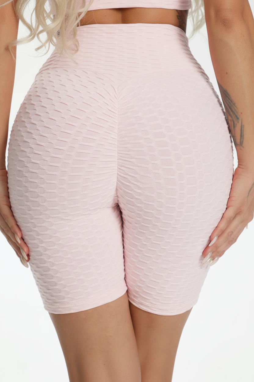 Ladies' high-waisted pink TikTok shorts with textured ruched design – figure-hugging slimming gym and workout shorts 