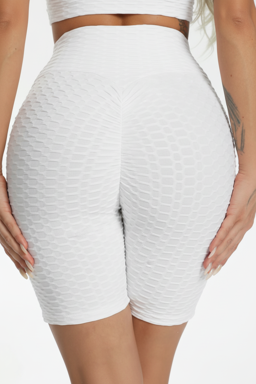 Ladies' high-waisted white TikTok shorts with textured ruched design – figure-hugging slimming gym and workout shorts 