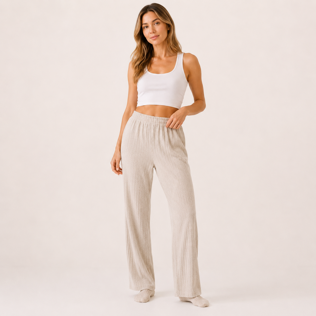 Relax in comfort and style with these beautifully soft ribbed lounge trousers. Designed with a flattering relaxed fit and elasticated waistband, they’re perfect for cosy days at home, travel, or casual everyday wear.