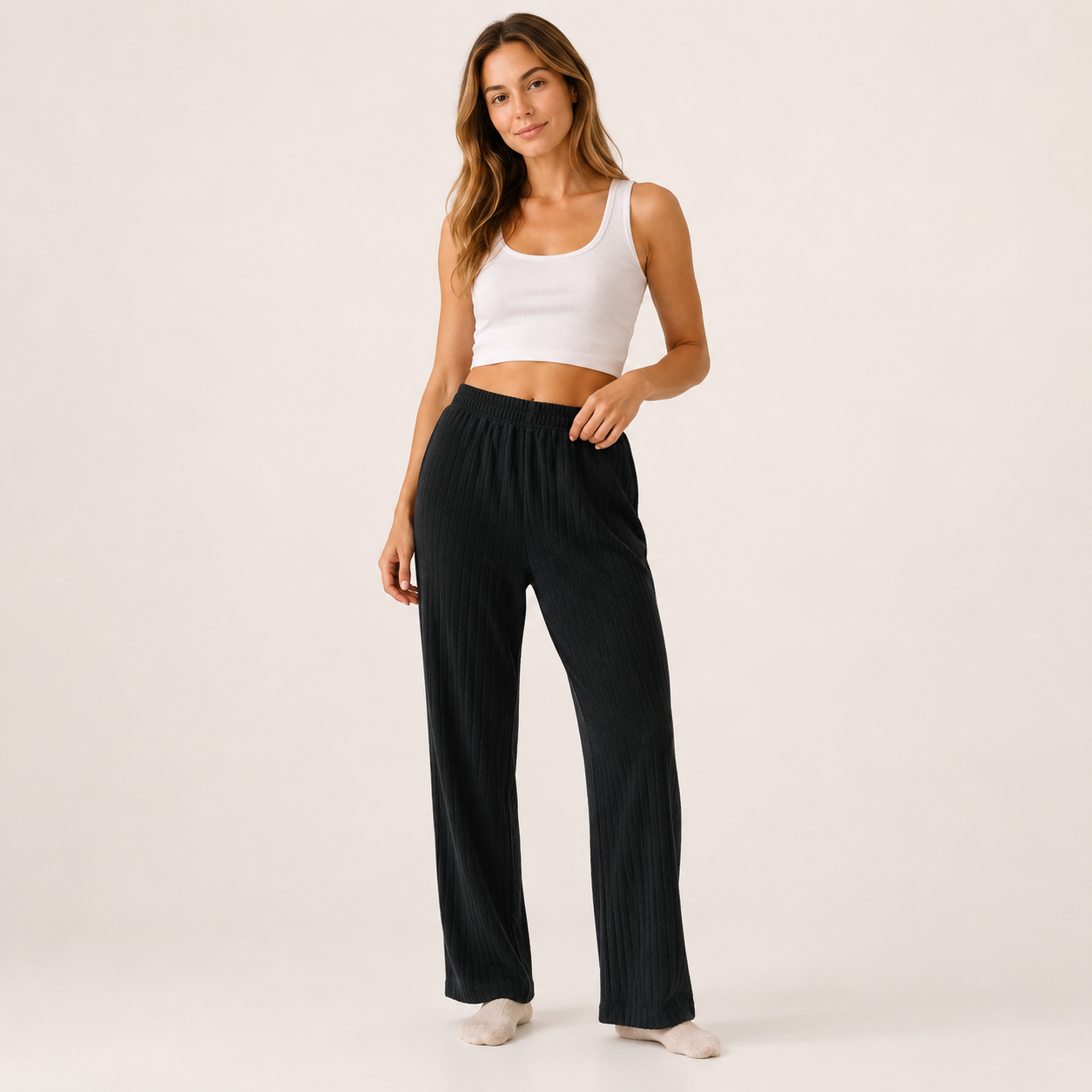 Relax in comfort and style with these beautifully soft ribbed lounge trousers. Designed with a flattering relaxed fit and elasticated waistband, they’re perfect for cosy days at home, travel, or casual everyday wear.