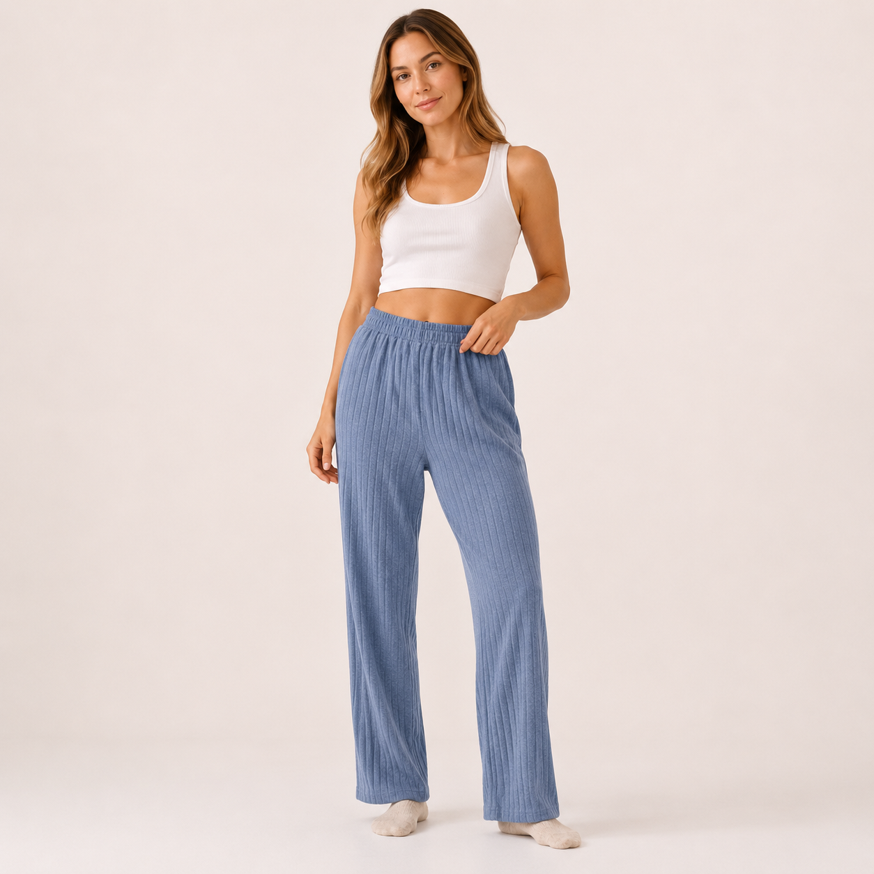 Relax in comfort and style with these beautifully soft ribbed lounge trousers. Designed with a flattering relaxed fit and elasticated waistband, they’re perfect for cosy days at home, travel, or casual everyday wear.