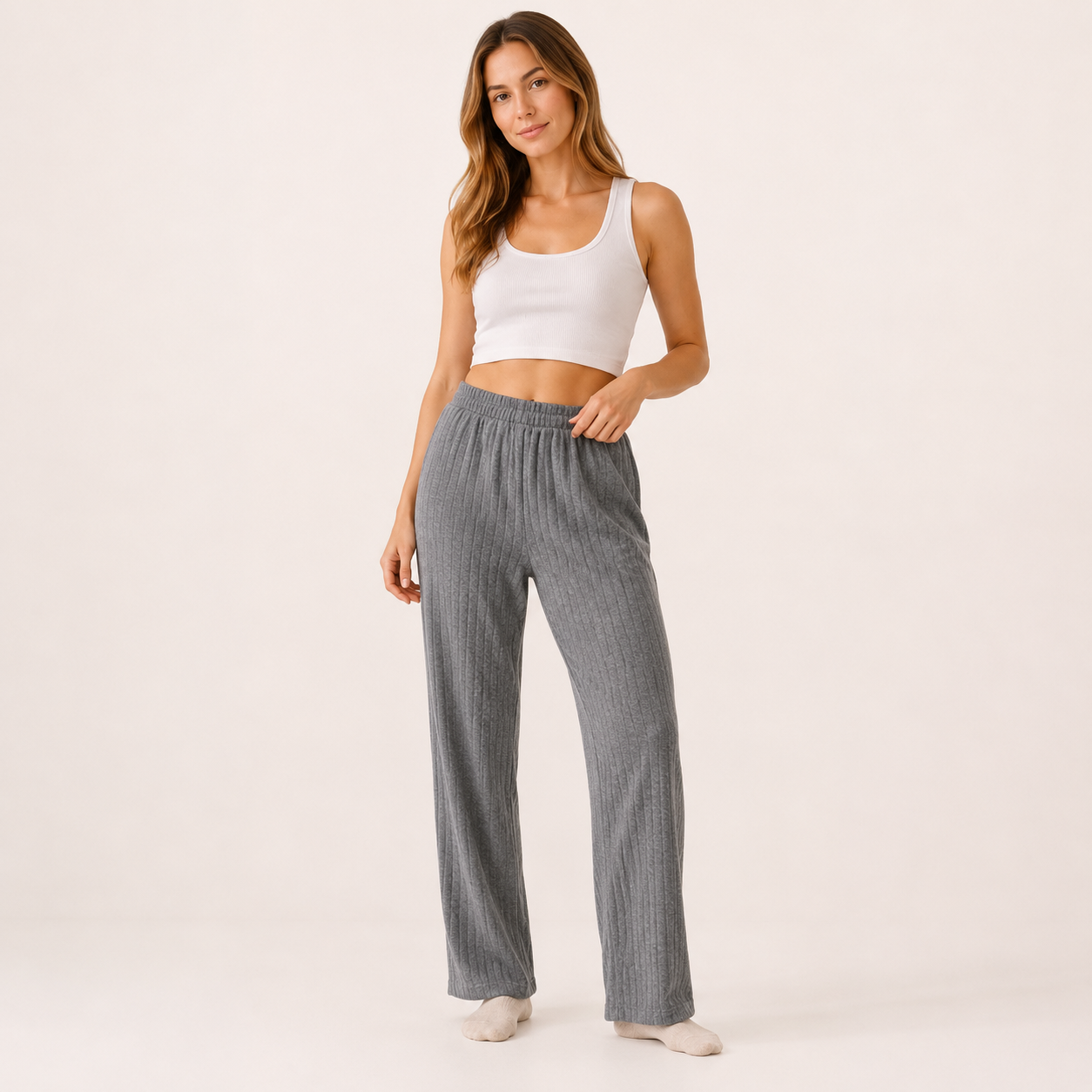 Relax in comfort and style with these beautifully soft ribbed lounge trousers. Designed with a flattering relaxed fit and elasticated waistband, they’re perfect for cosy days at home, travel, or casual everyday wear.