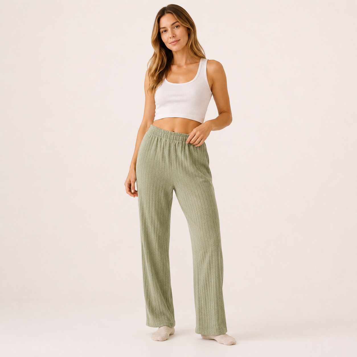 Relax in comfort and style with these beautifully soft ribbed lounge trousers. Designed with a flattering relaxed fit and elasticated waistband, they’re perfect for cosy days at home, travel, or casual everyday wear.
