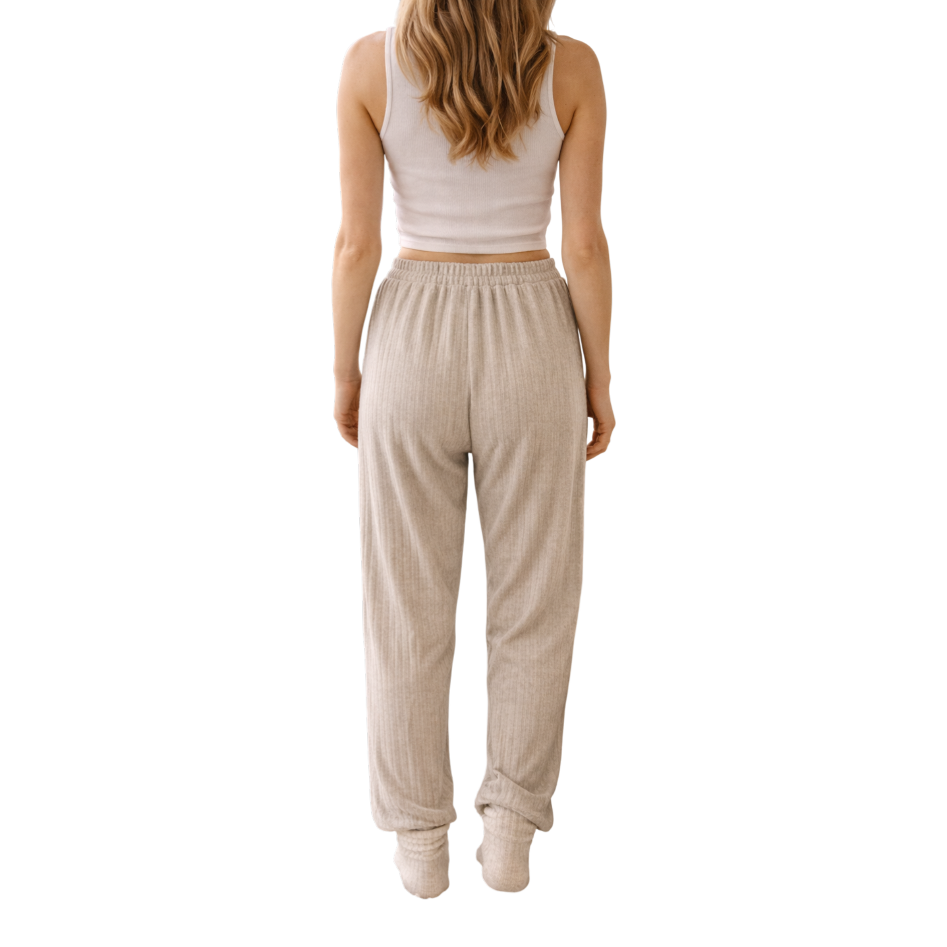 Relax in comfort and style with these beautifully soft ribbed lounge trousers. Designed with a flattering relaxed fit and elasticated waistband, they’re perfect for cosy days at home, travel, or casual everyday wear.