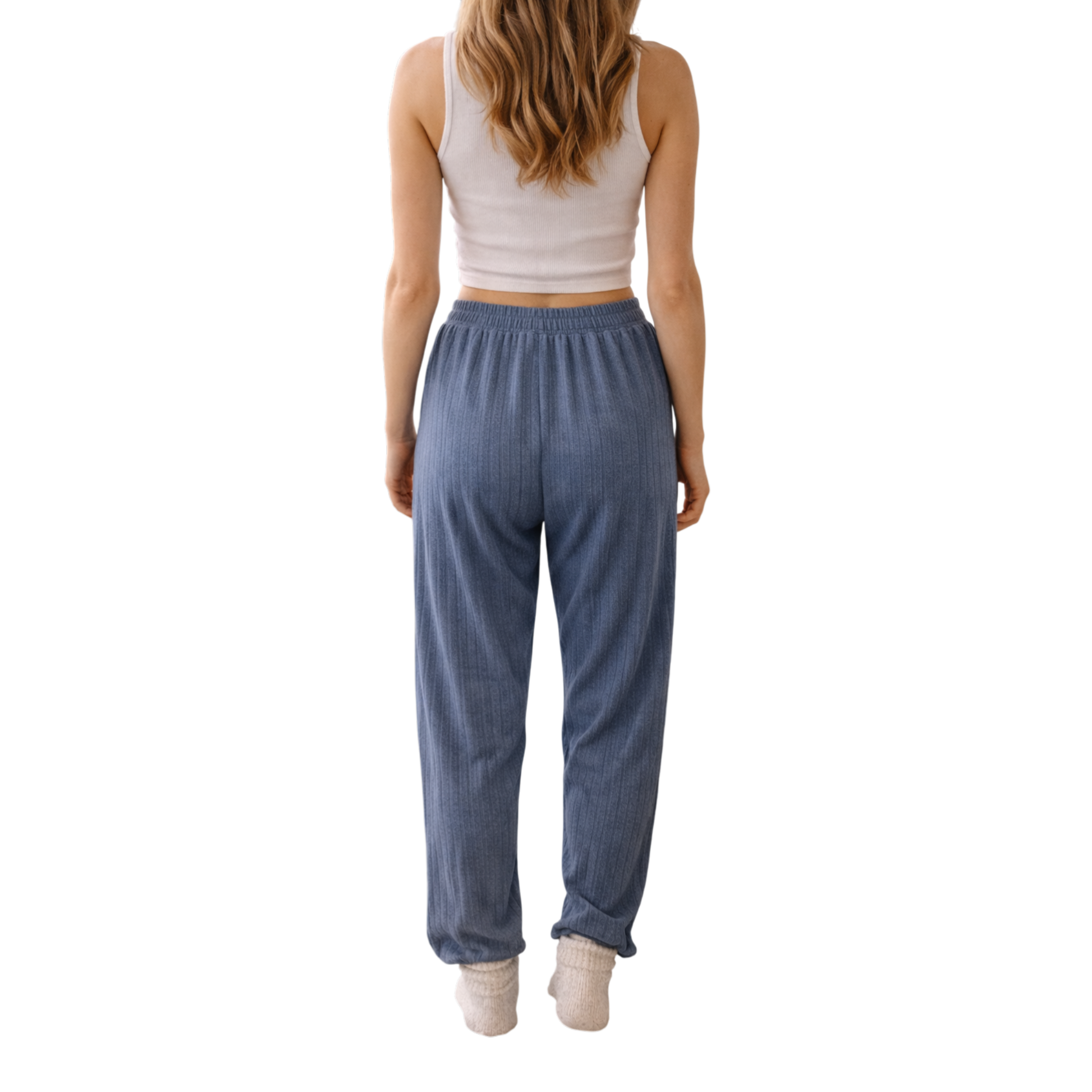 Relax in comfort and style with these beautifully soft ribbed lounge trousers. Designed with a flattering relaxed fit and elasticated waistband, they’re perfect for cosy days at home, travel, or casual everyday wear.