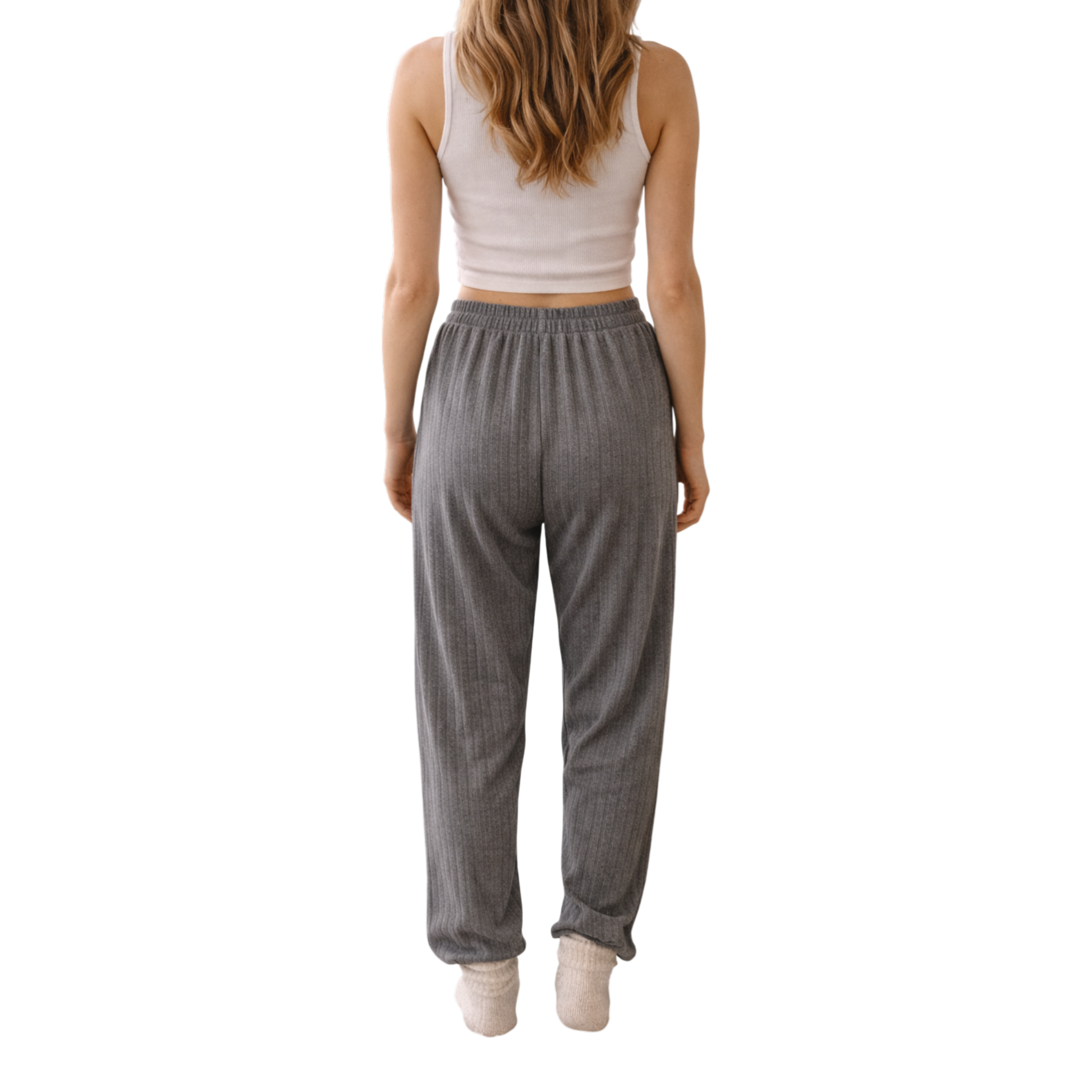 Relax in comfort and style with these beautifully soft ribbed lounge trousers. Designed with a flattering relaxed fit and elasticated waistband, they’re perfect for cosy days at home, travel, or casual everyday wear.