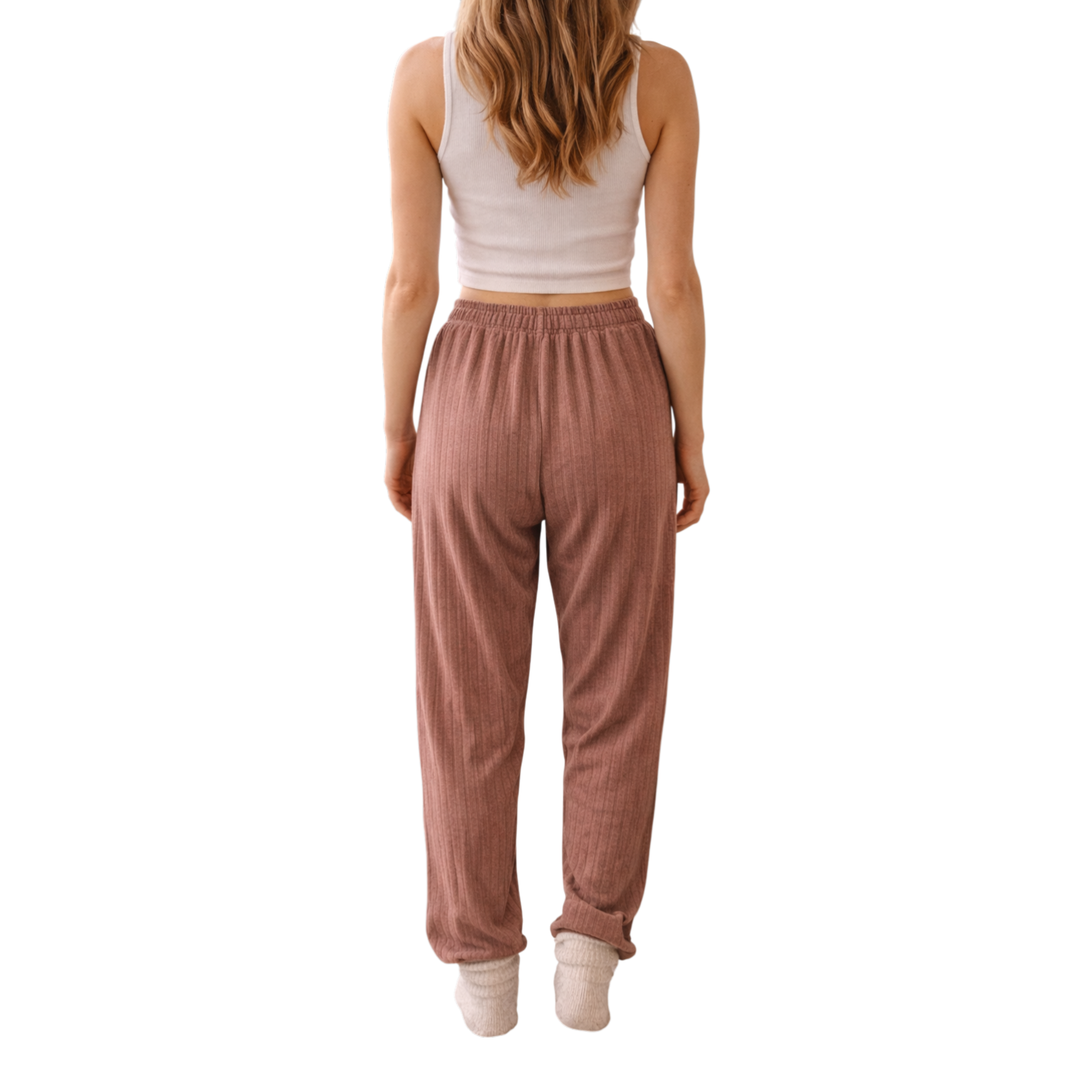 Relax in comfort and style with these beautifully soft ribbed lounge trousers. Designed with a flattering relaxed fit and elasticated waistband, they’re perfect for cosy days at home, travel, or casual everyday wear.