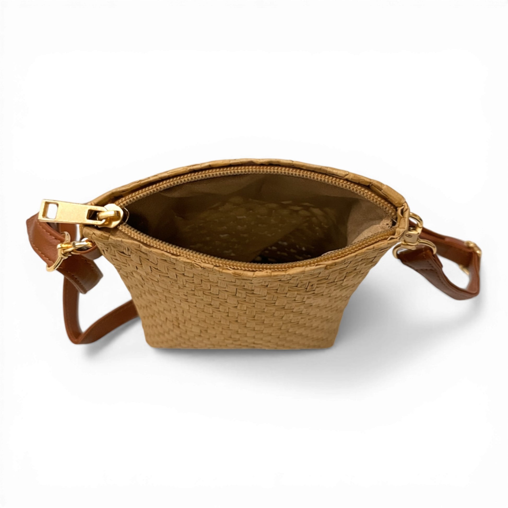 Ladies woven crossbody bag with adjustable strap available in tan. Perfect for small accessories such as your phone, keys, cards and small essentials.