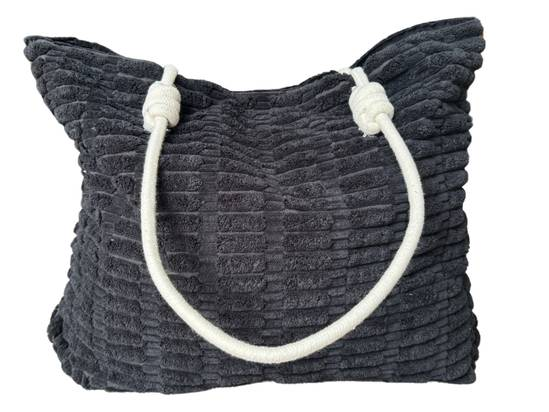 Black spacious towelling tote bag for beach holidays with soft textured fabric
