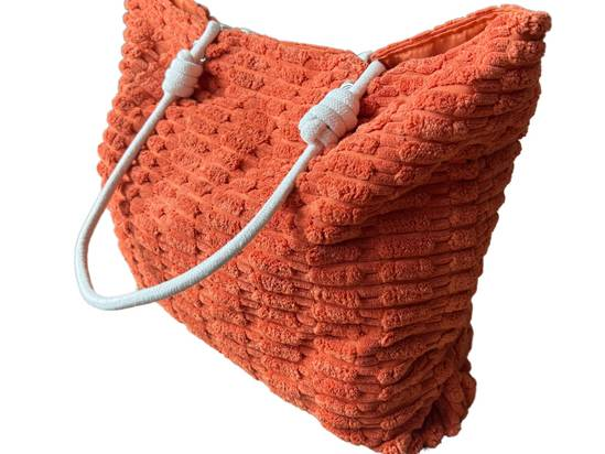 Orange spacious towelling tote bag for beach holidays with soft textured fabric
