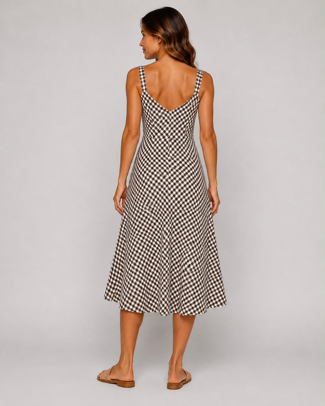 Shop our brown gingham Ladies midi cami dress, featuring a flattering V-neckline and relaxed flowing fit. A versatile summer dress perfect for holidays, brunch and everyday wear.