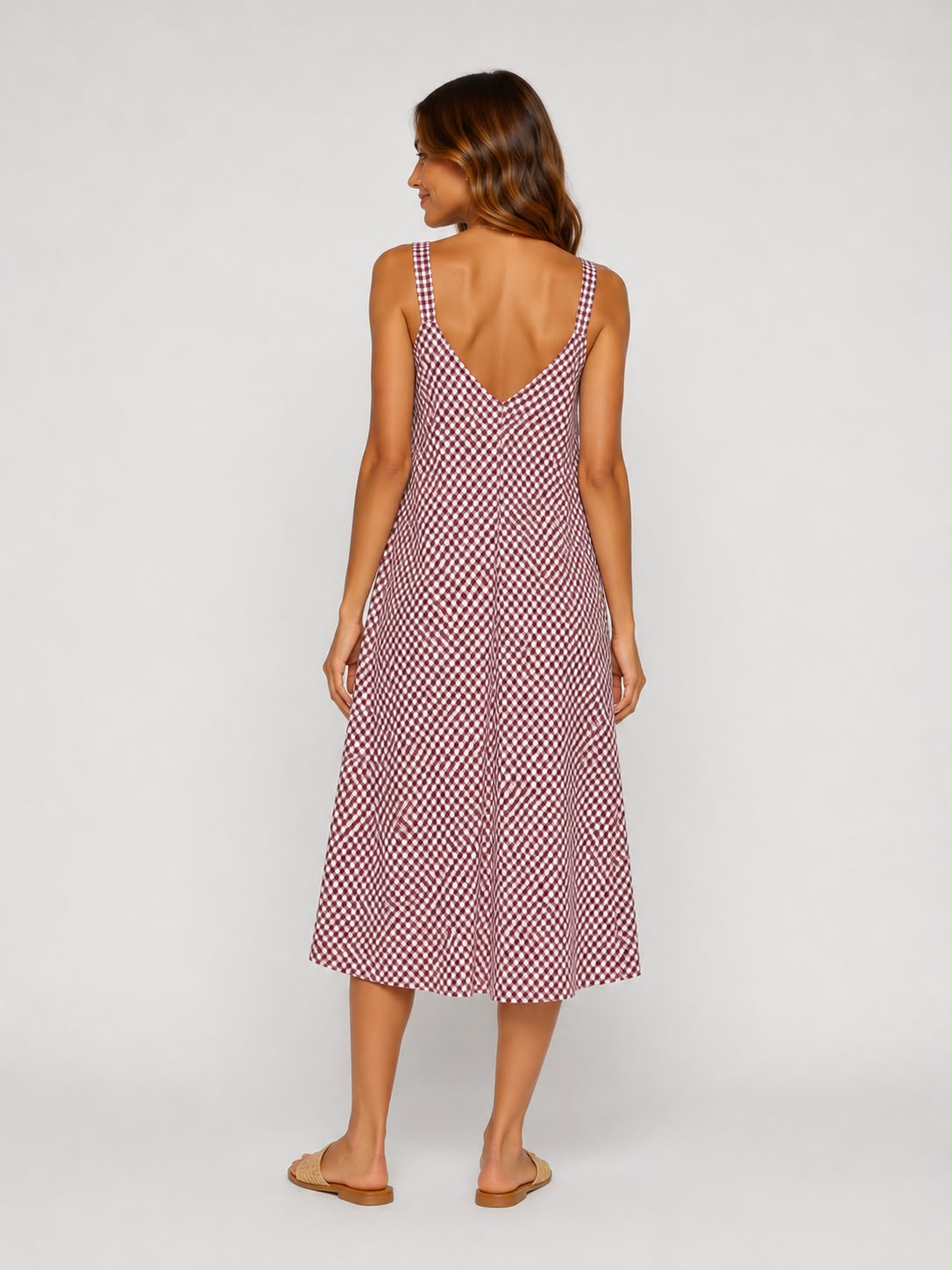 Shop our burgundy gingham midi cami dress, featuring a flattering V-neckline and relaxed flowing fit. A versatile summer dress perfect for holidays, brunch and everyday wear.