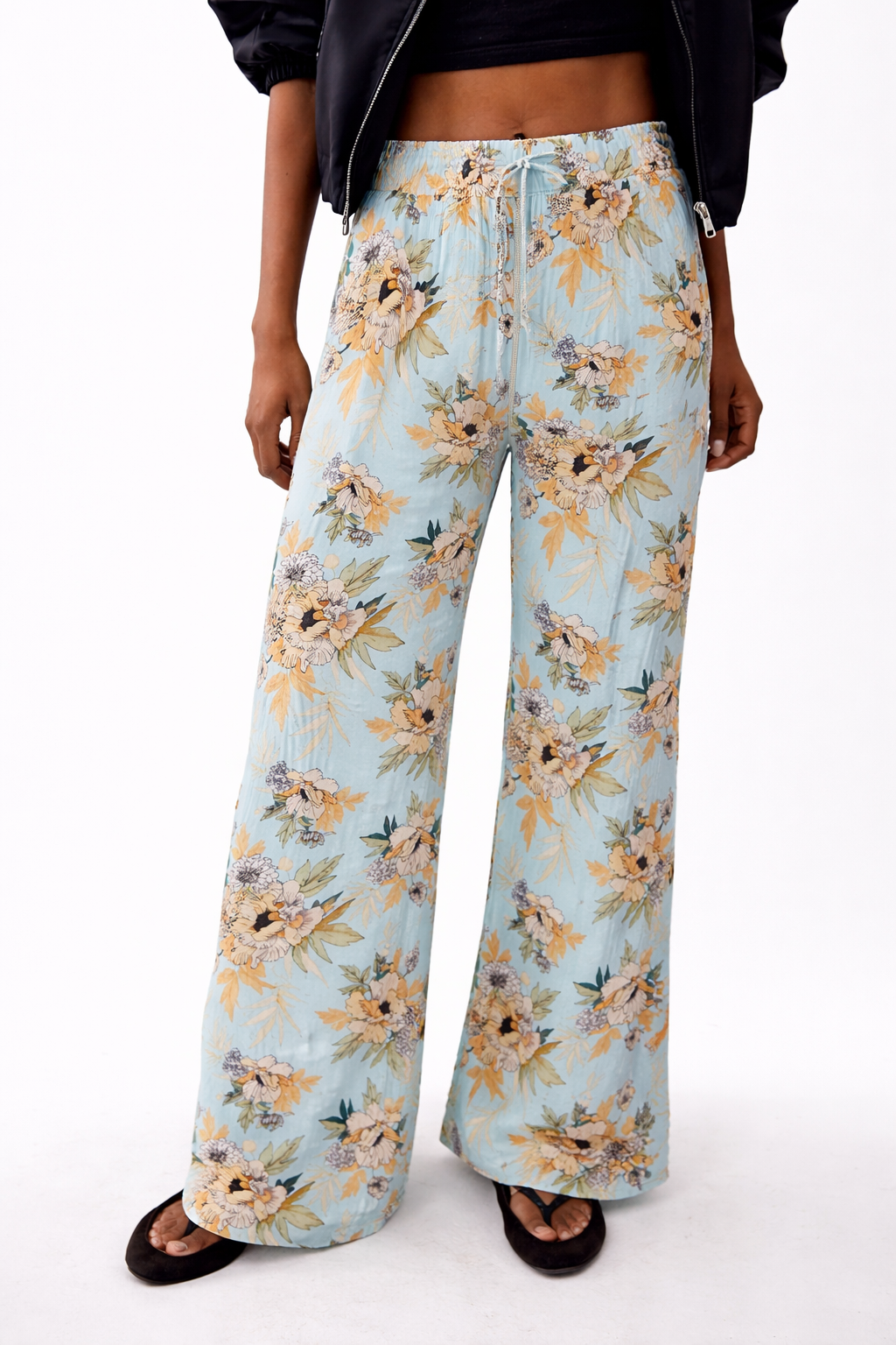 Ladies floral palazzo trousers – lightweight wide leg summer pants with blue background and yellow flower pattern