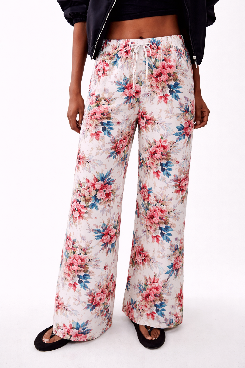 Ladies floral palazzo trousers – lightweight wide leg summer pants with white background and red, blue and pink flower pattern