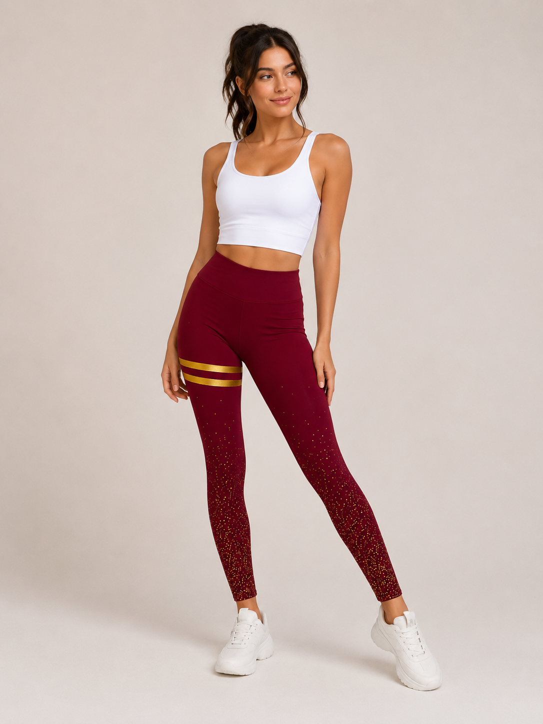 Ladies Burgundy high-waisted leggings with gold stripes and glitter detail for women.