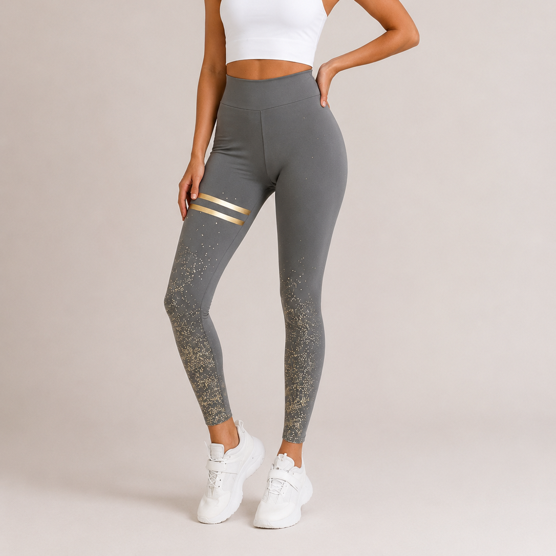 Ladies grey high-waisted leggings with gold stripes and glitter detail for women.