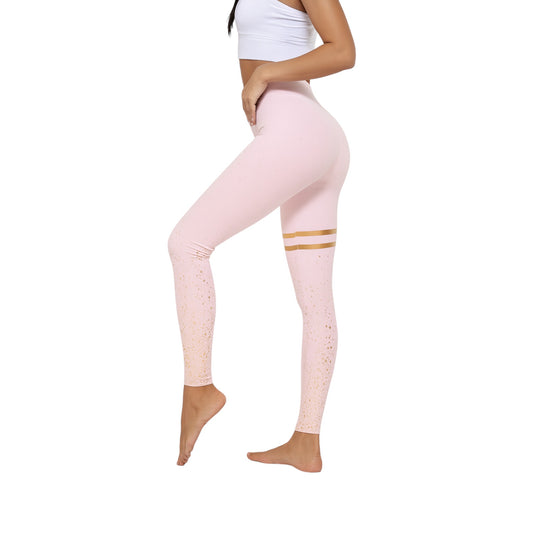 Ladies pink high-waisted leggings with gold stripes and glitter detail for women.