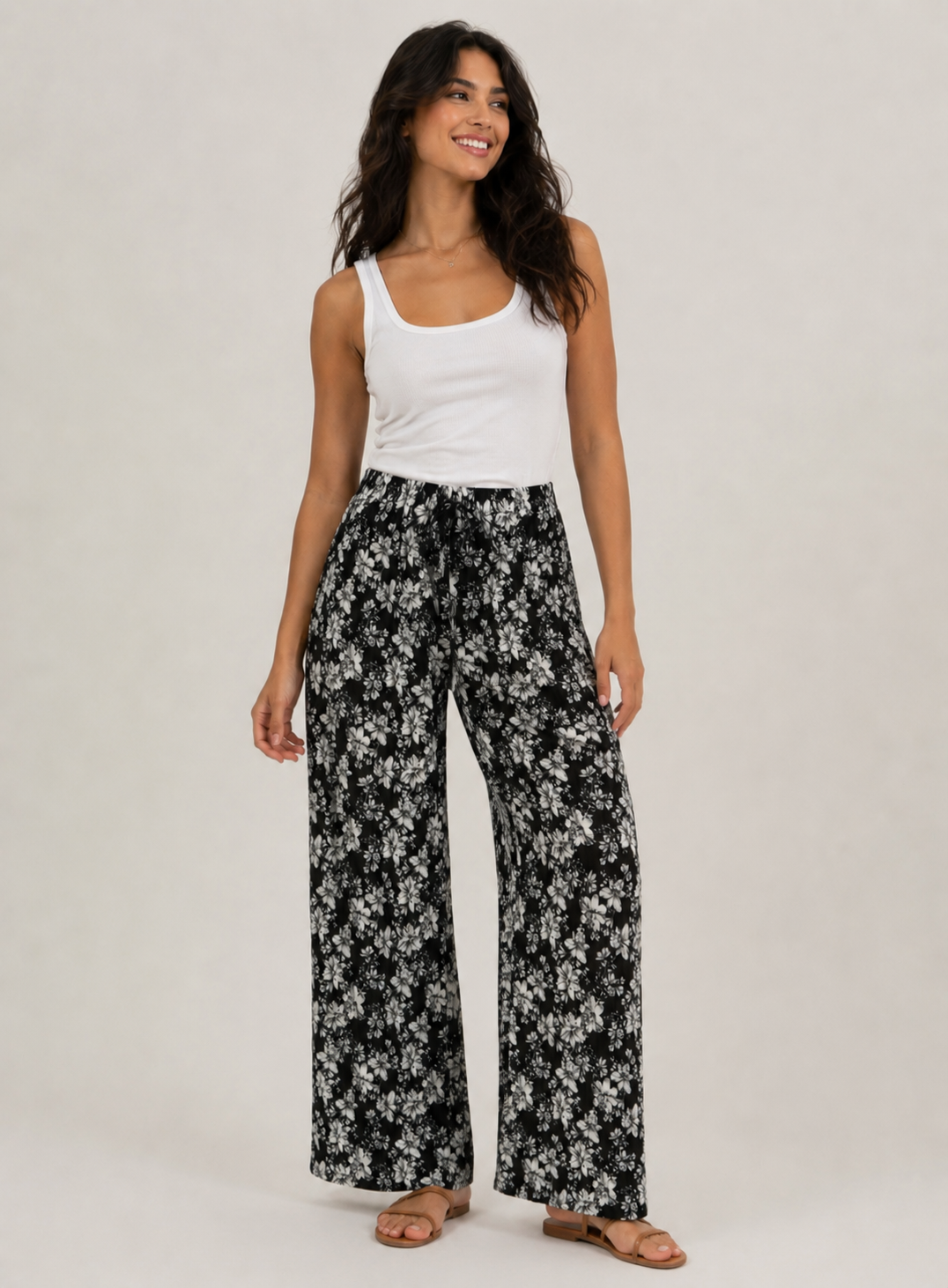 Ladies black floral print harem palazzo trousers with elastic waistband and drawstring
