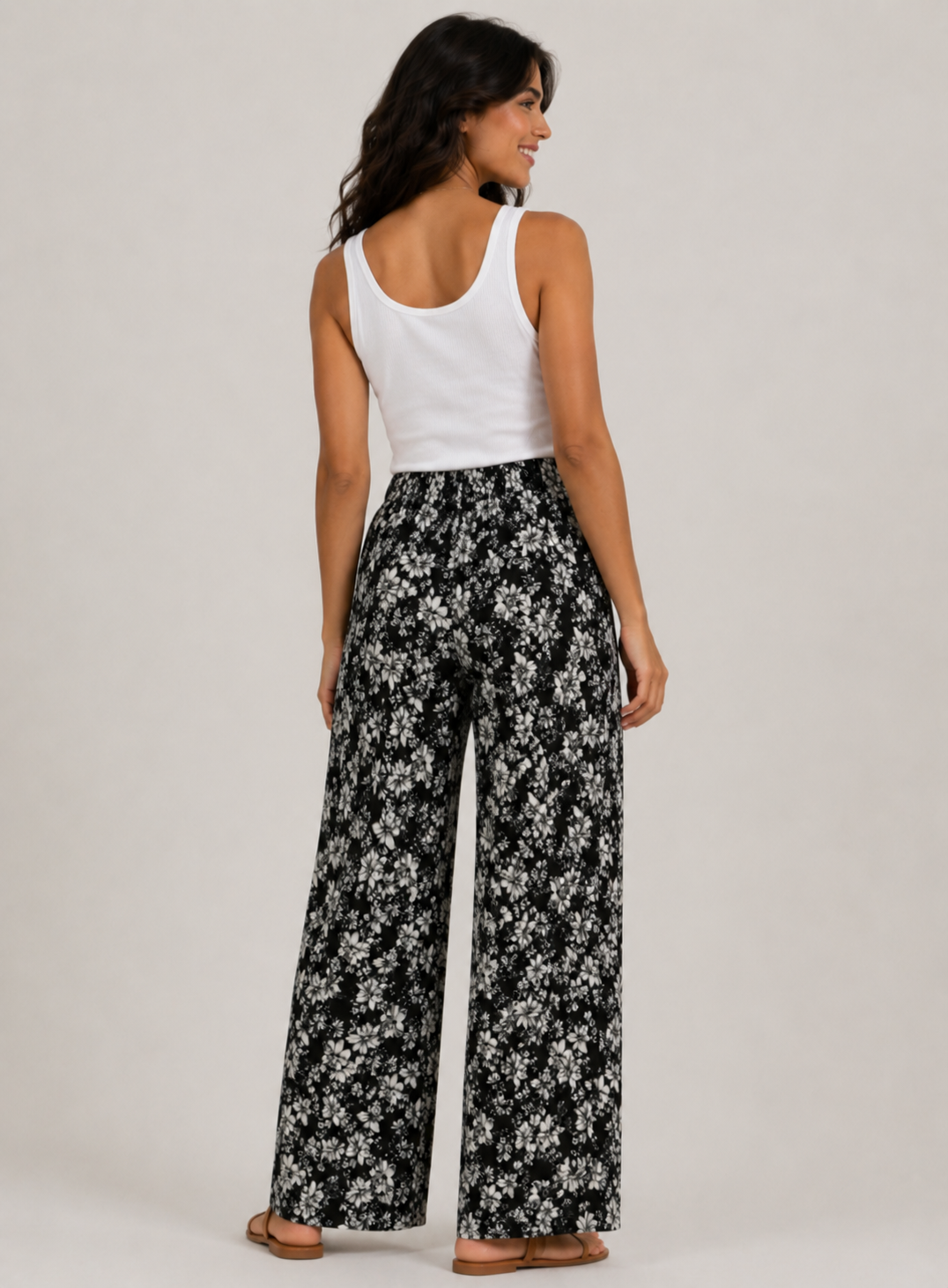 Ladies black floral print harem palazzo trousers with elastic waistband and drawstring