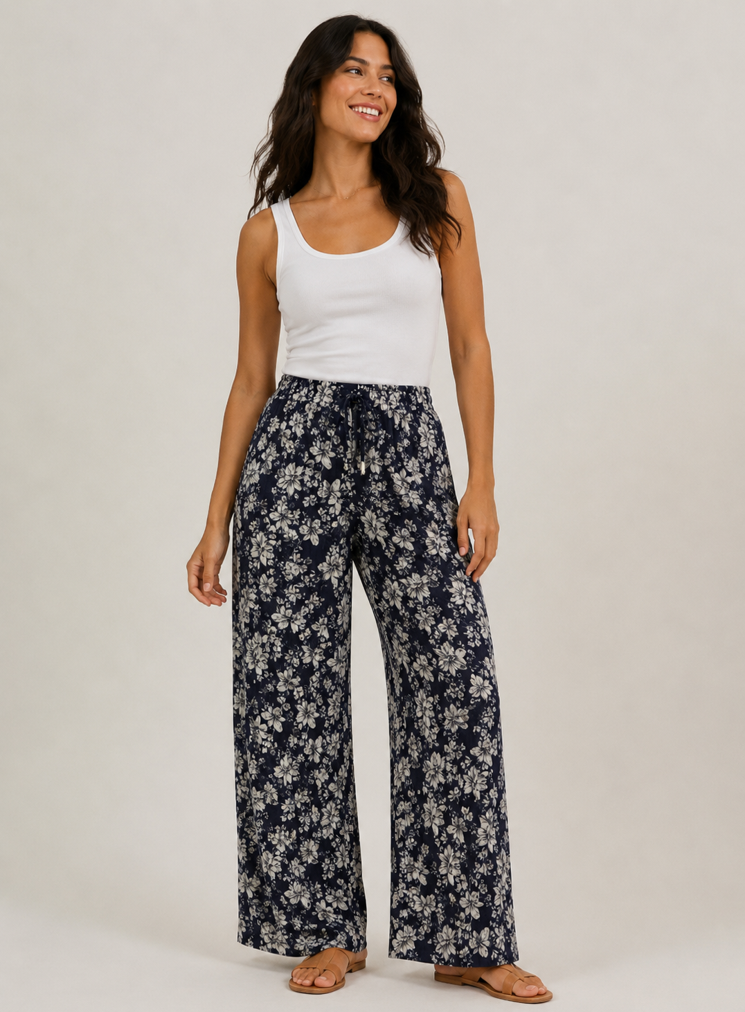 Ladies navy floral print harem palazzo trousers with elastic waistband and drawstring