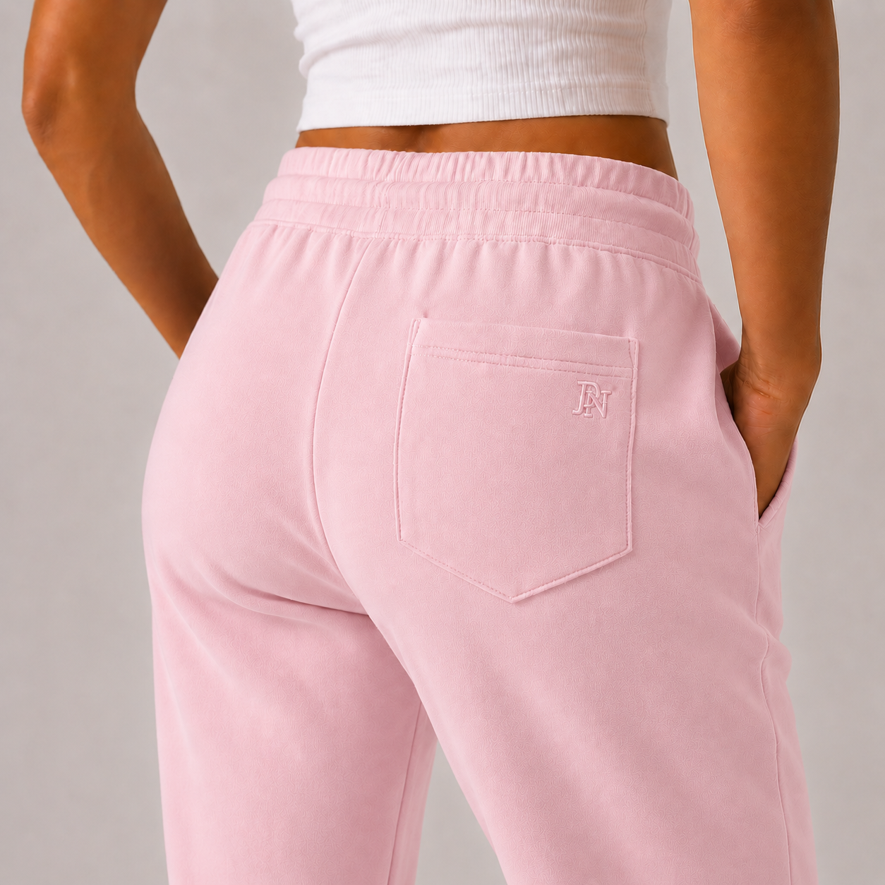 Women’s pink high-waisted joggers with drawstring waist and cuffed ankles – soft loungewear trousers