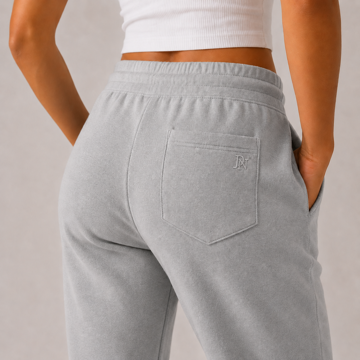 Women’s grey high-waisted joggers with drawstring waist and cuffed ankles – soft loungewear trousers