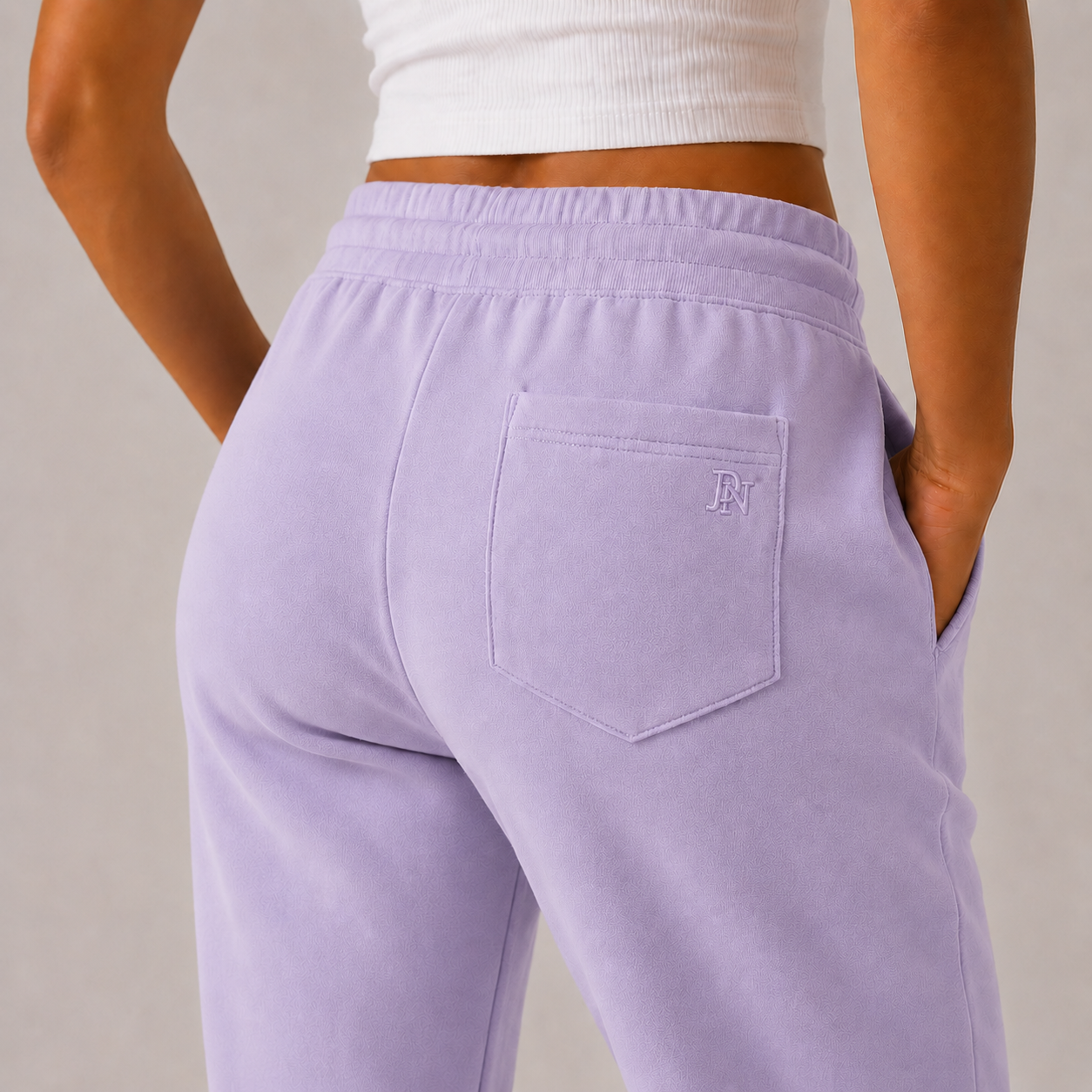 Women’s lilac high-waisted joggers with drawstring waist and cuffed ankles – soft loungewear trousers