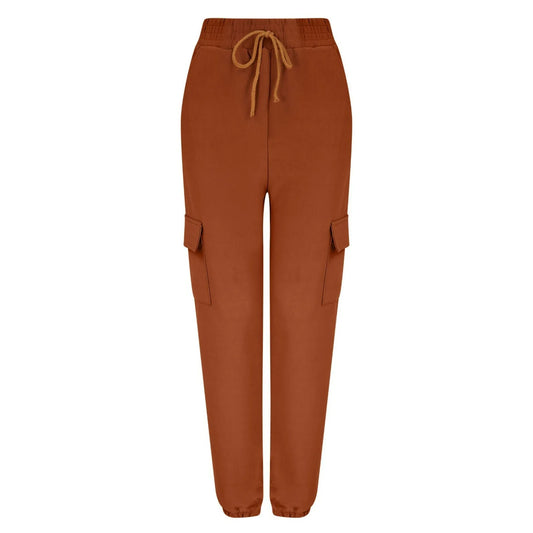 Women's terracotta combat-style joggers with elasticated waistband, drawstring tie, and side cargo pockets – casual utility trousers