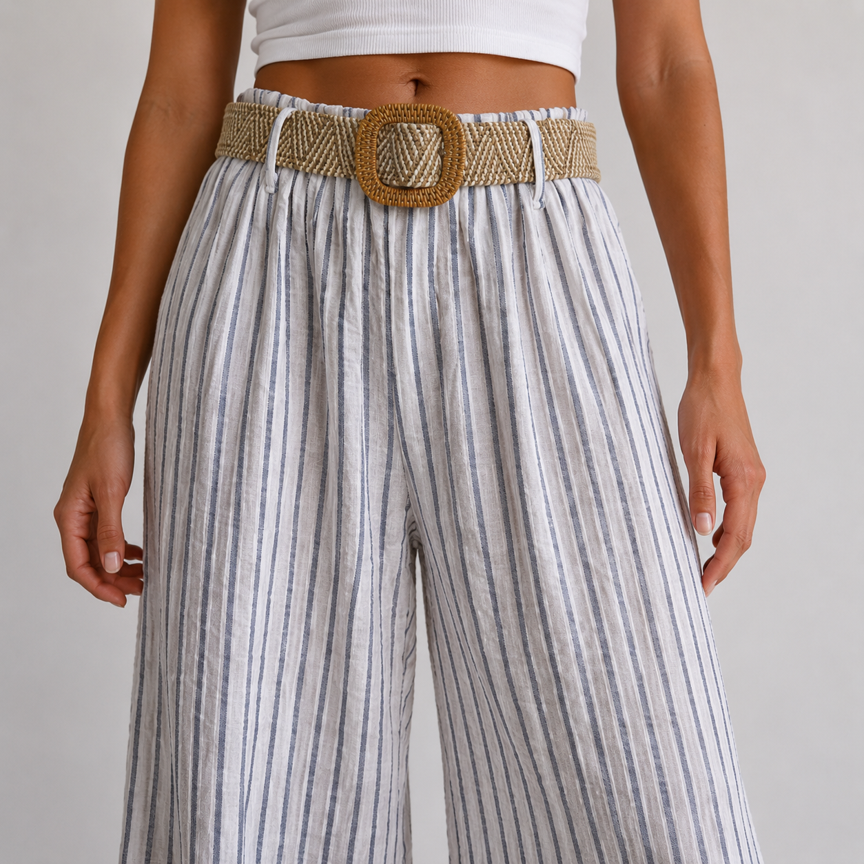Ladies blue and white Italian stripe wide leg trousers with woven belt on female model, linen mix summer trousers UK 10-18.