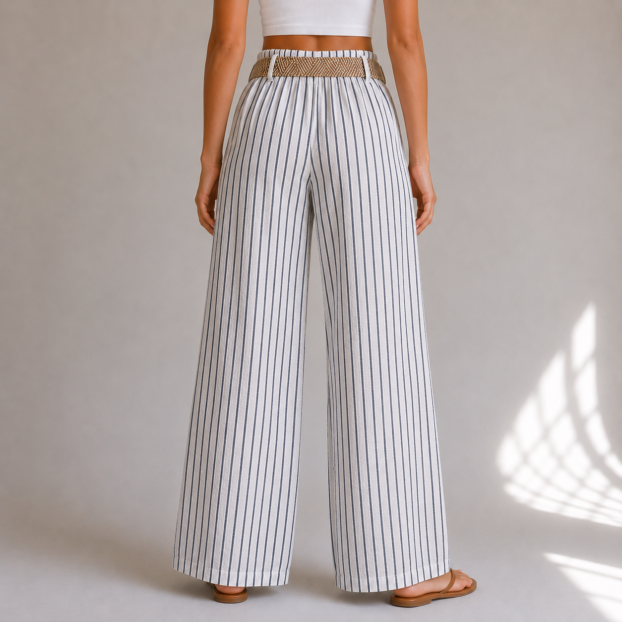 Ladies blue and white Italian stripe wide leg trousers with woven belt on female model, linen mix summer trousers UK 10-18.