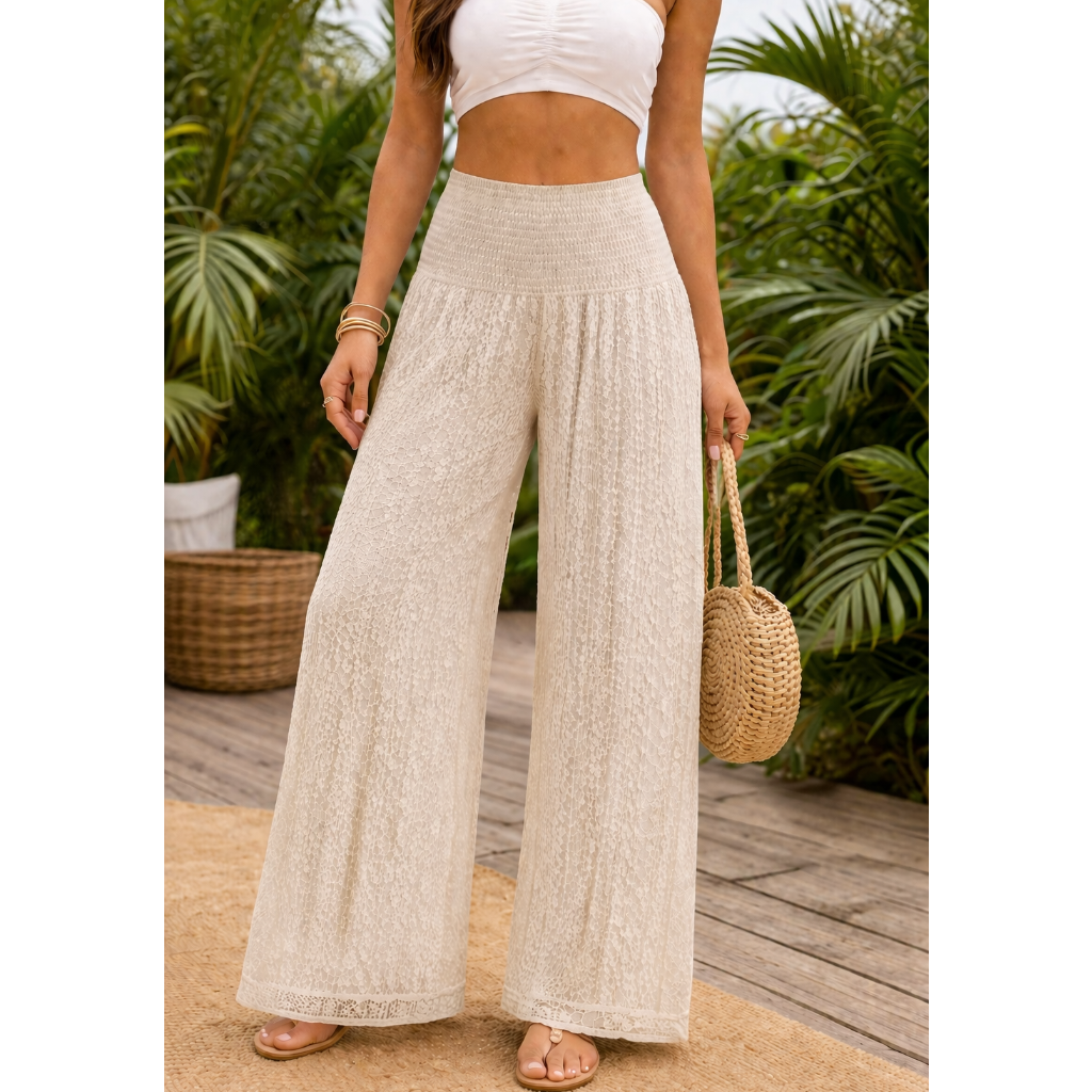 Upgrade your summer wardrobe with our lace wide leg trousers, designed for effortless style and all-day comfort. Featuring a high-waisted smocked waistband and a flowing wide-leg silhouette, these trousers create a flattering, elongating fit perfect for warm-weather dressing
