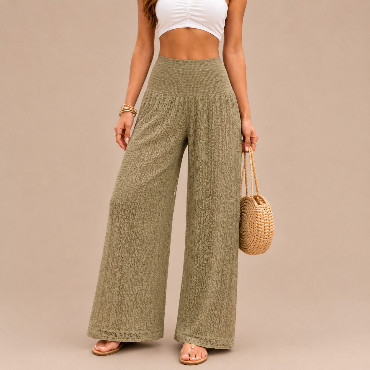 Upgrade your summer wardrobe with our lace wide leg trousers, designed for effortless style and all-day comfort. Featuring a high-waisted smocked waistband and a flowing wide-leg silhouette, these trousers create a flattering, elongating fit perfect for warm-weather dressing.