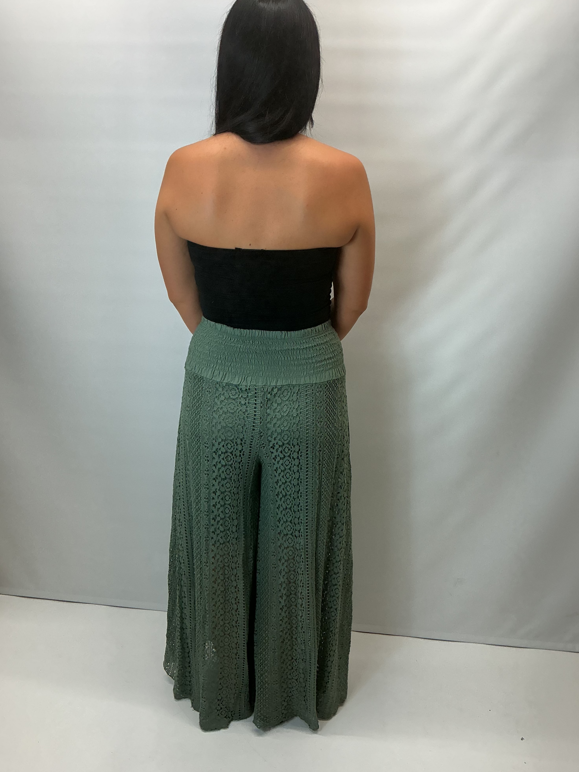 Upgrade your summer wardrobe with our lace wide leg trousers, designed for effortless style and all-day comfort. Featuring a high-waisted smocked waistband and a flowing wide-leg silhouette, these trousers create a flattering, elongating fit perfect for warm-weather dressing.