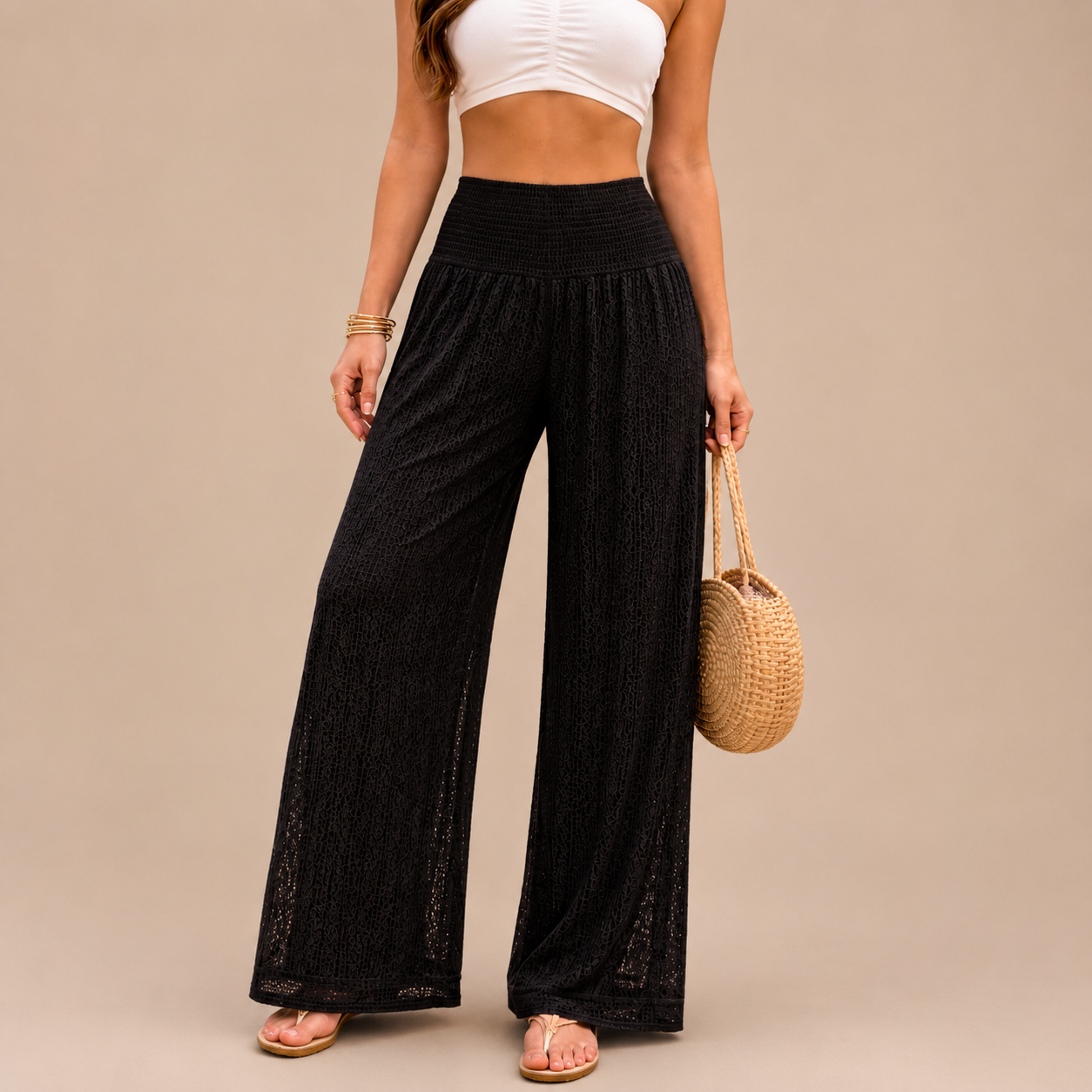 Upgrade your summer wardrobe with our lace wide leg trousers, designed for effortless style and all-day comfort. Featuring a high-waisted smocked waistband and a flowing wide-leg silhouette, these trousers create a flattering, elongating fit perfect for warm-weather dressing.