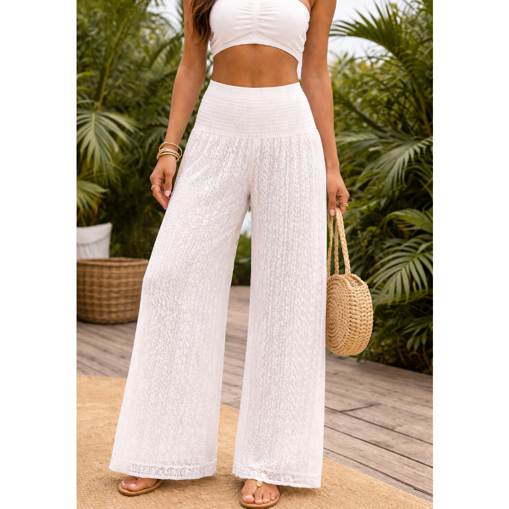 Upgrade your summer wardrobe with our lace wide leg trousers, designed for effortless style and all-day comfort. Featuring a high-waisted smocked waistband and a flowing wide-leg silhouette, these trousers create a flattering, elongating fit perfect for warm-weather dressing.
