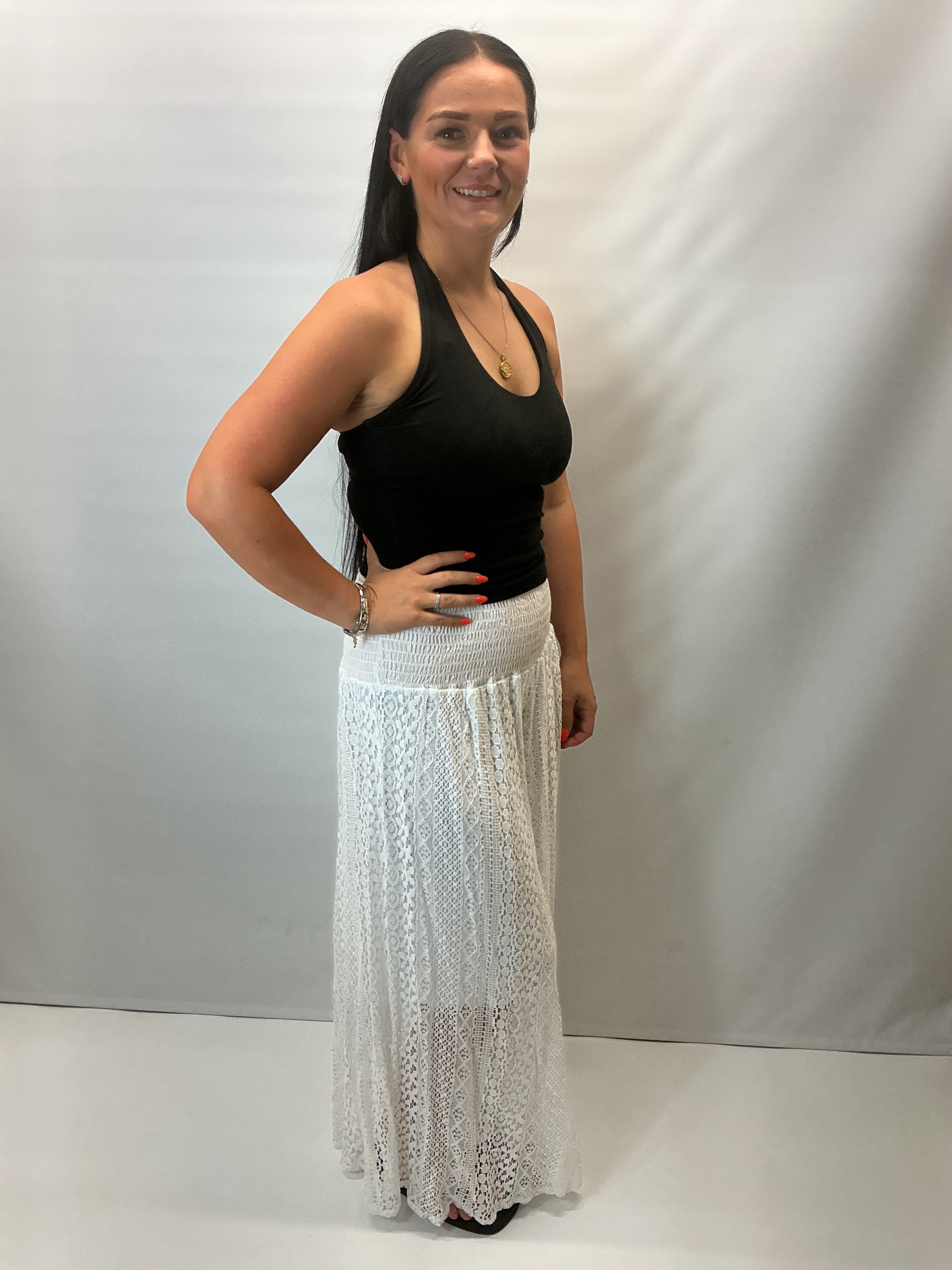 Upgrade your summer wardrobe with our lace wide leg trousers, designed for effortless style and all-day comfort. Featuring a high-waisted smocked waistband and a flowing wide-leg silhouette, these trousers create a flattering, elongating fit perfect for warm-weather dressing.