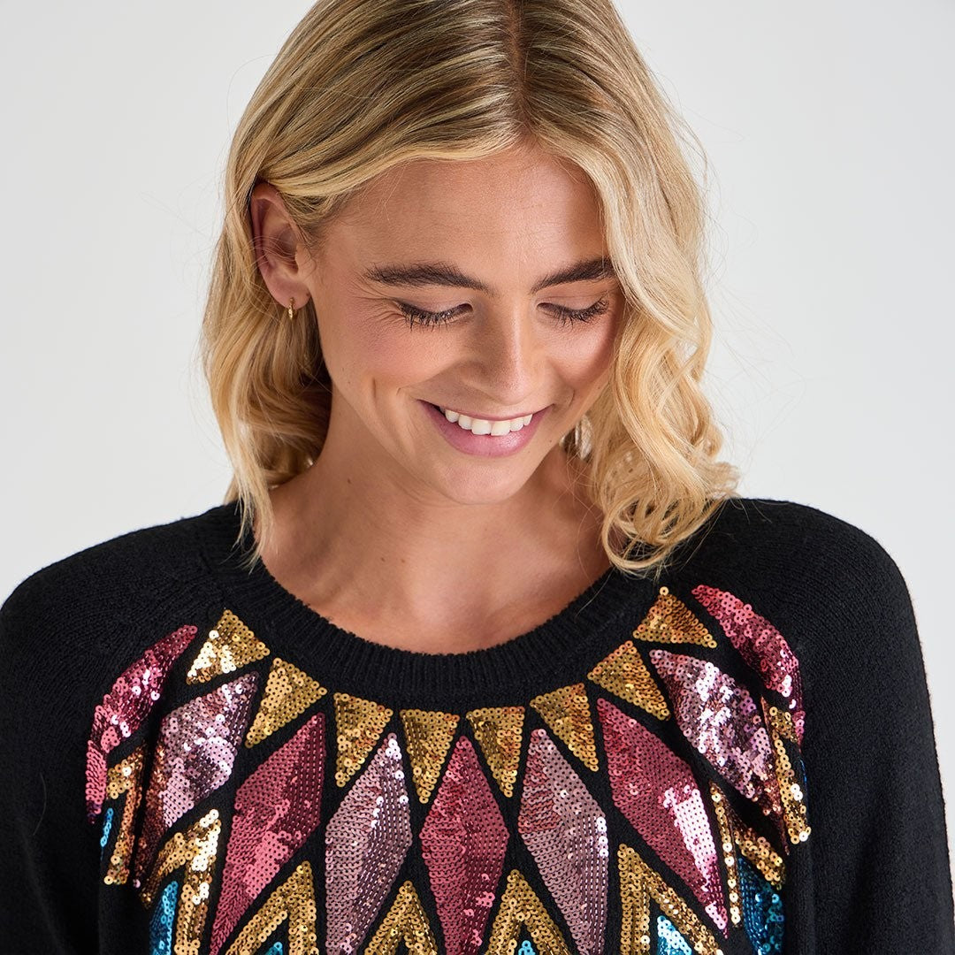 Ladies black jumper with colourful sequin detail around the neckline, long sleeve xmas sweater