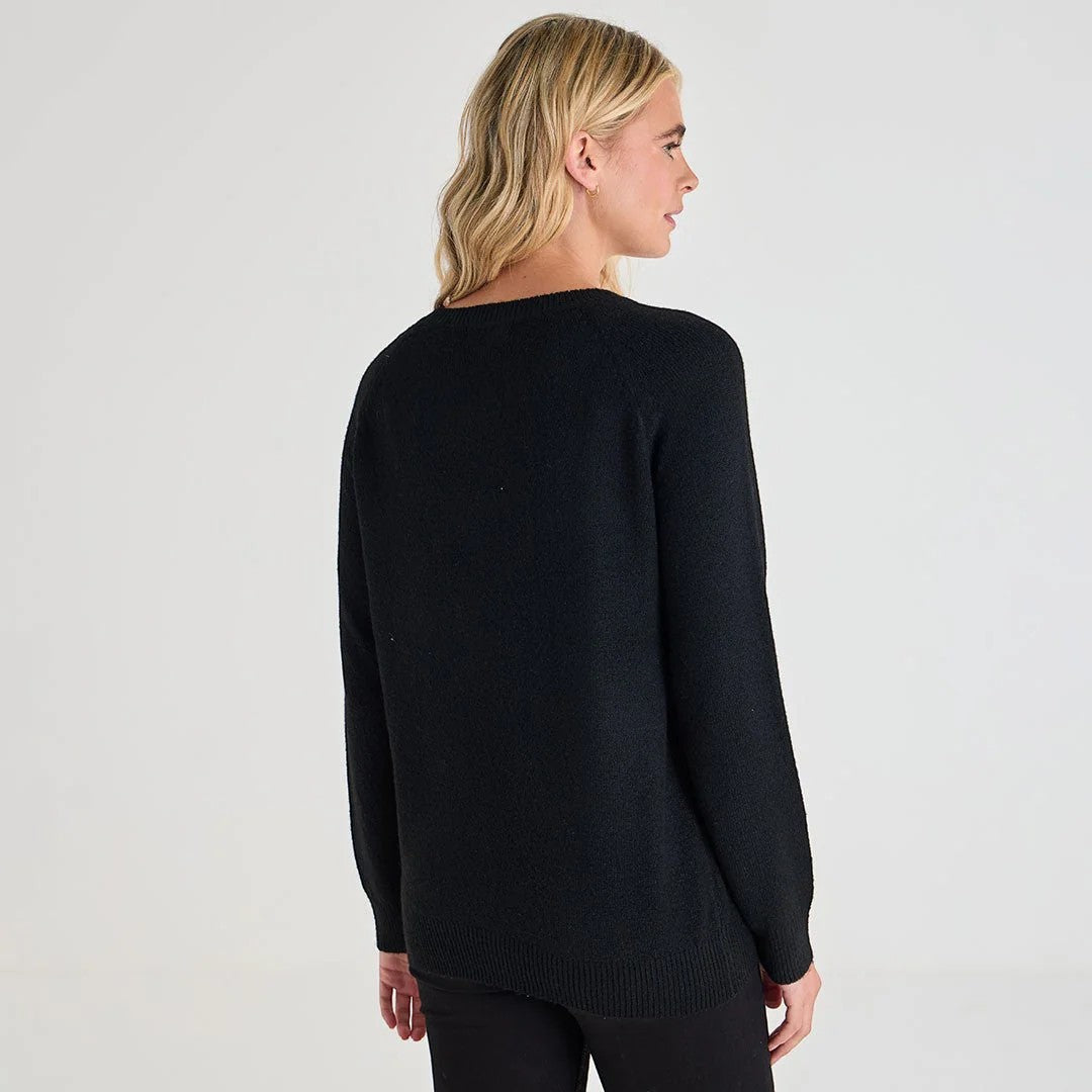 Ladies black jumper with colourful sequin detail around the neckline, long sleeve xmas sweater